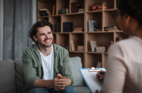 Man speaking with a woman during a conversation