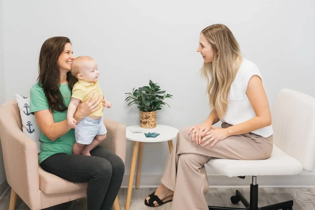 A pelvic floor therapist working with a patient who has clogged ducts