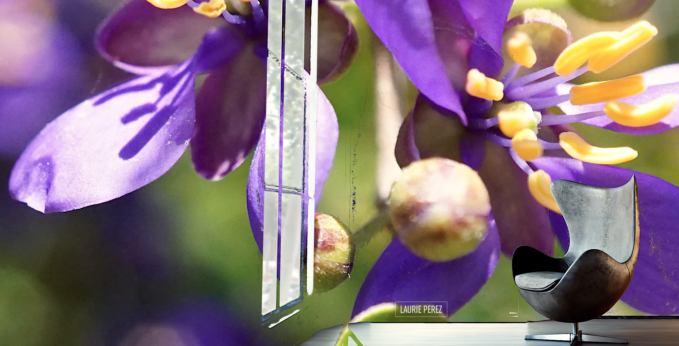 An inviting chair sit ready to host an alchemical conversation in a room defined by a giant purple iris blooming in a mural