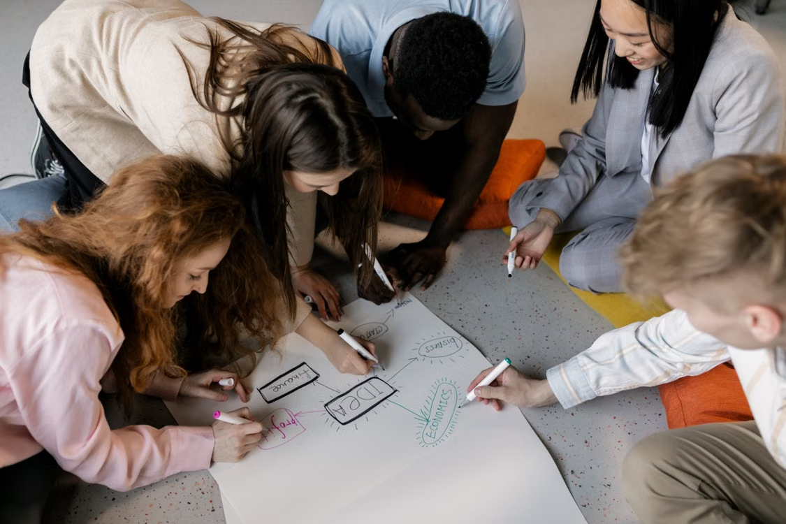 diverse team collaborating at a interactive workshop