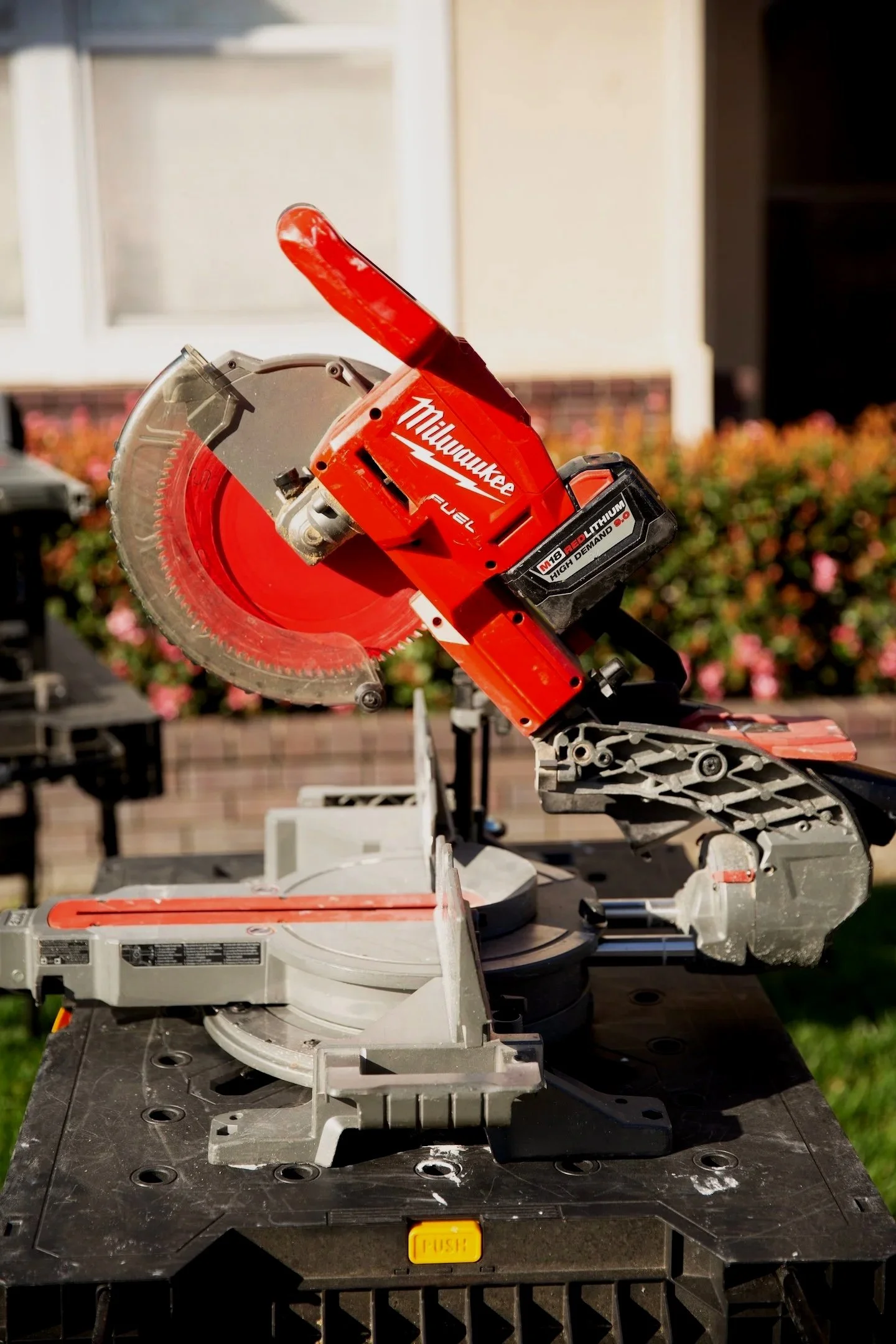 Mitre Saw on a table at an outdoor worksite.