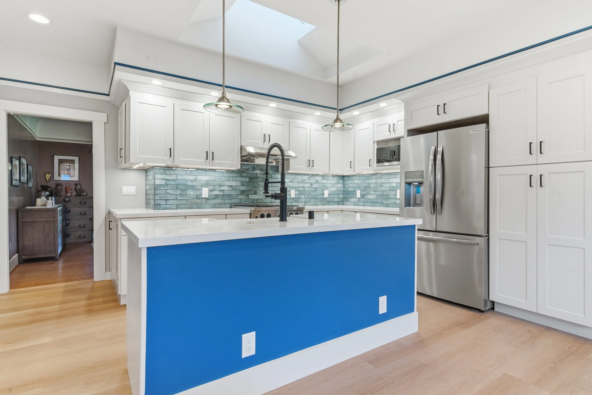 New Kitchen with bright blue island