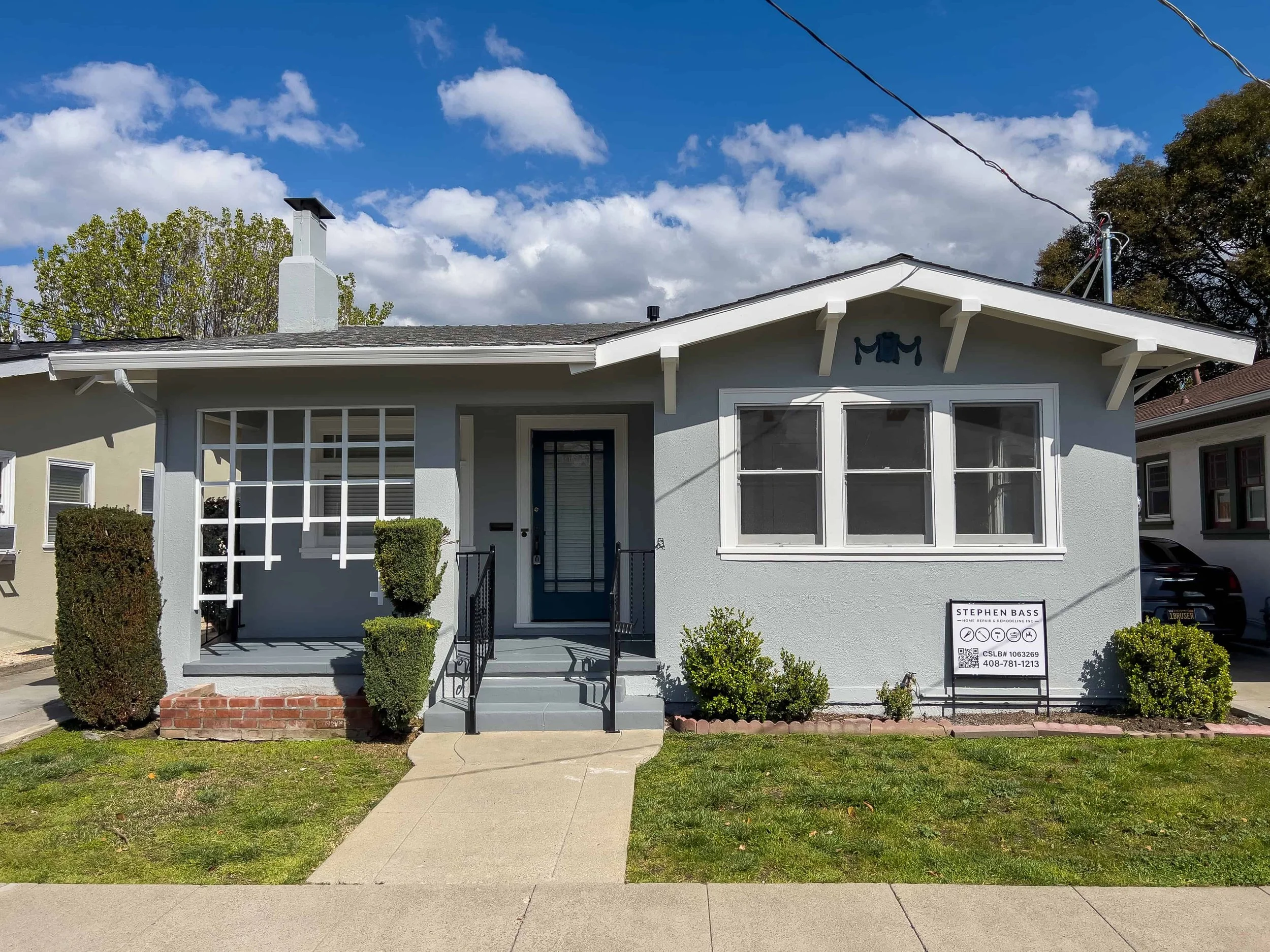 Renovated craftsman college with a gray exterior and white trim in downtown San Jose.