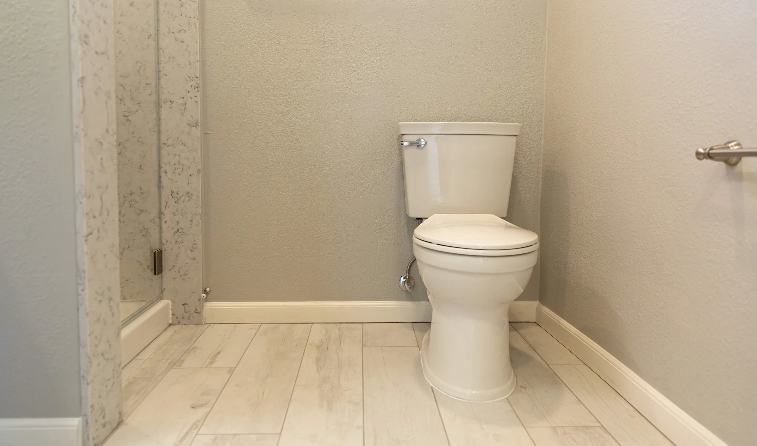 A bright, white bathroom ADU in San Hose.