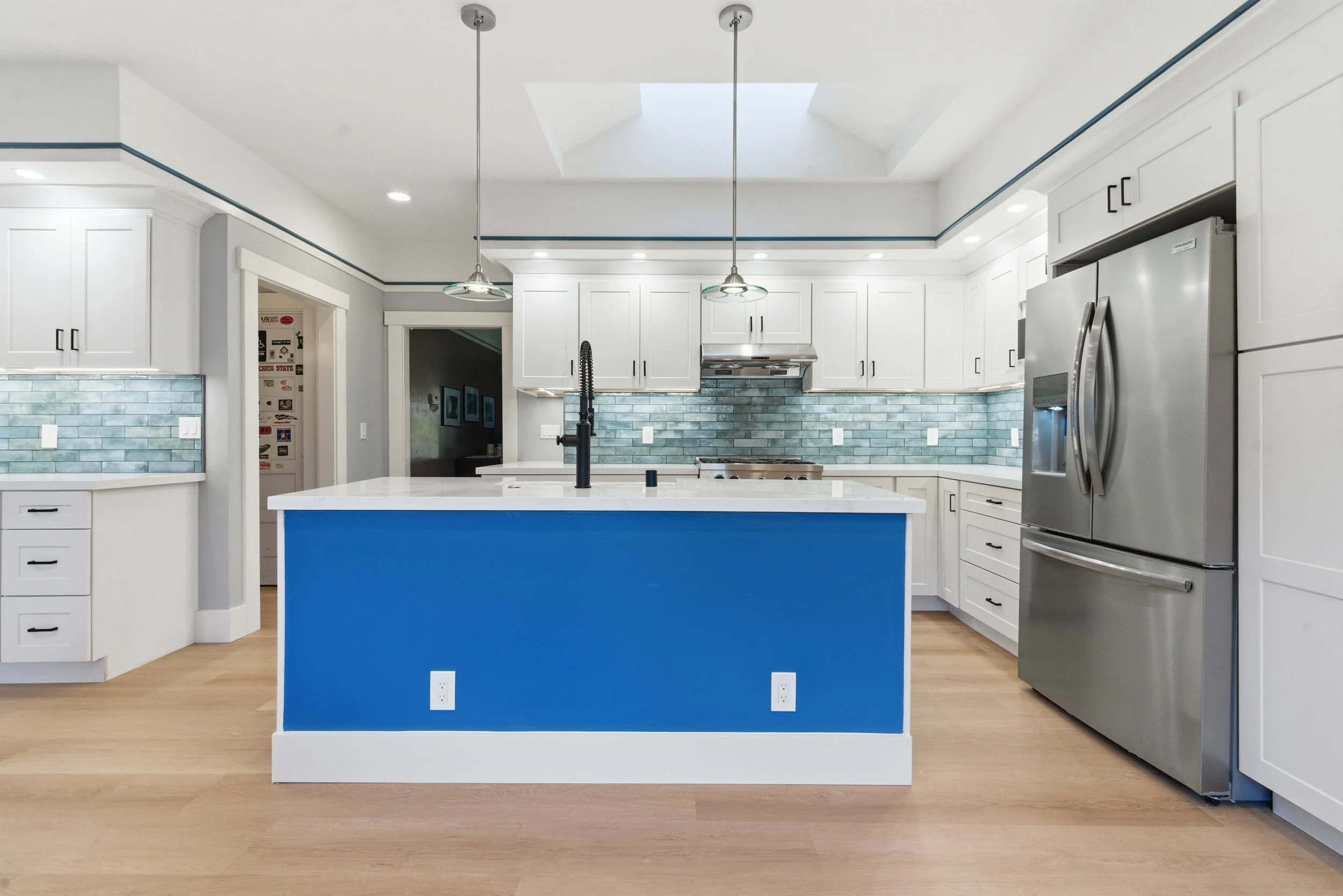Bright blue kitchen island in a newly renovated kitchen in San Jose.