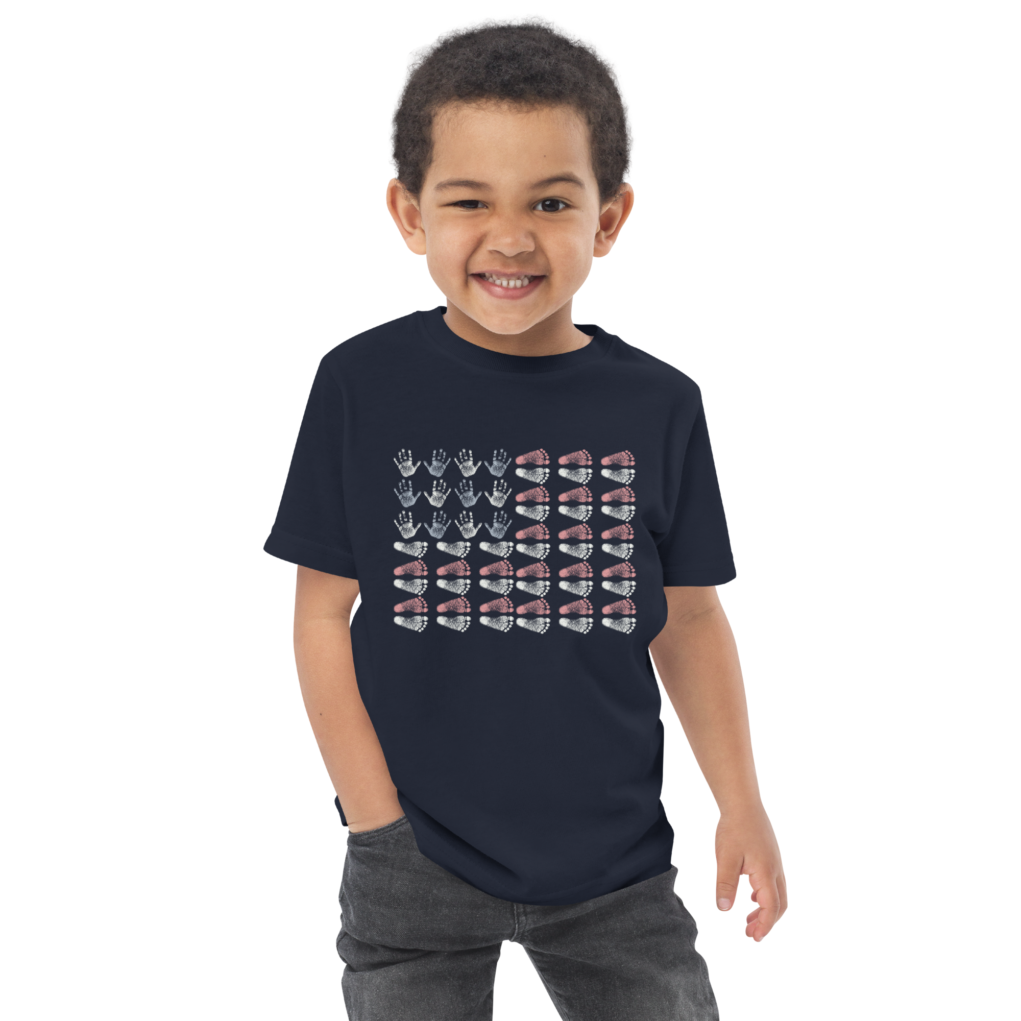 Young boy modeling the navy Tiny Hands, Tiny Feet, Big Courage NICU T-shirt.