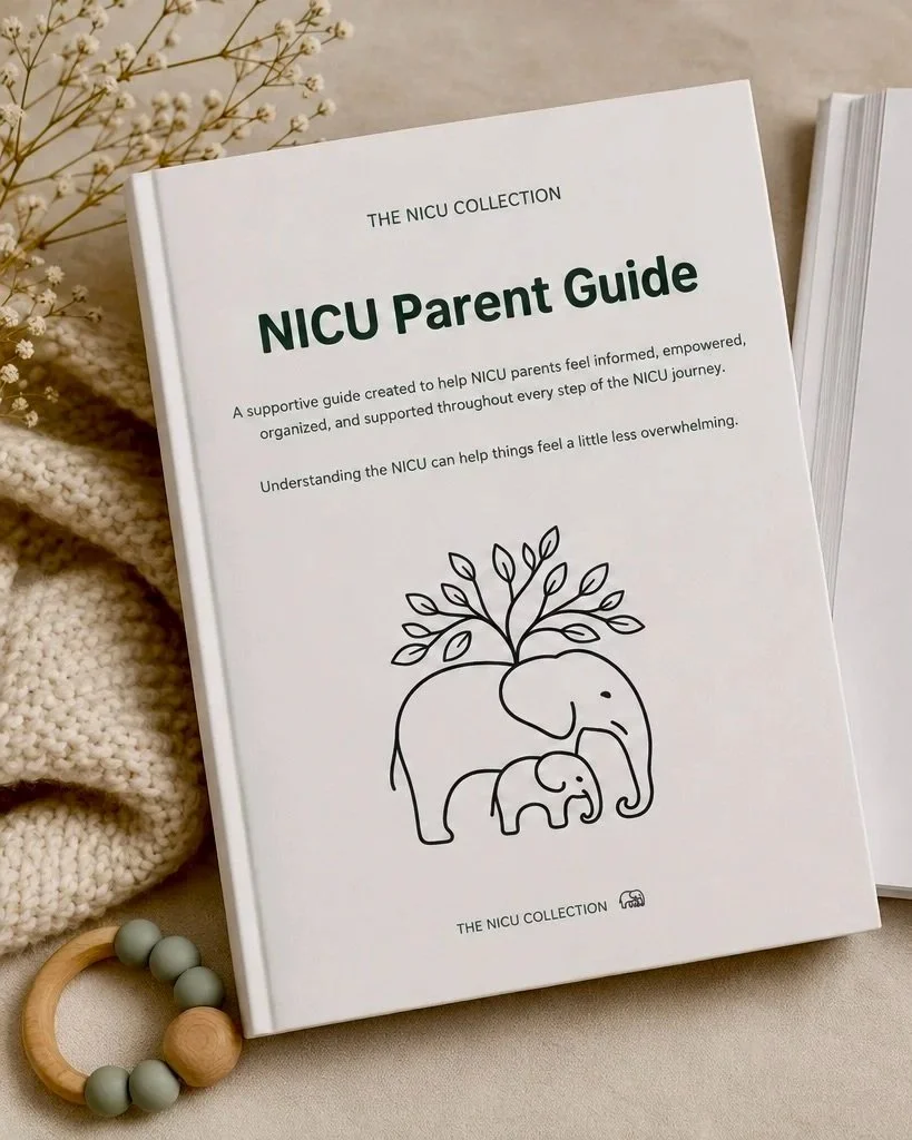 Printed NICU Parent Guide displayed on a soft neutral blanket with wooden beads.