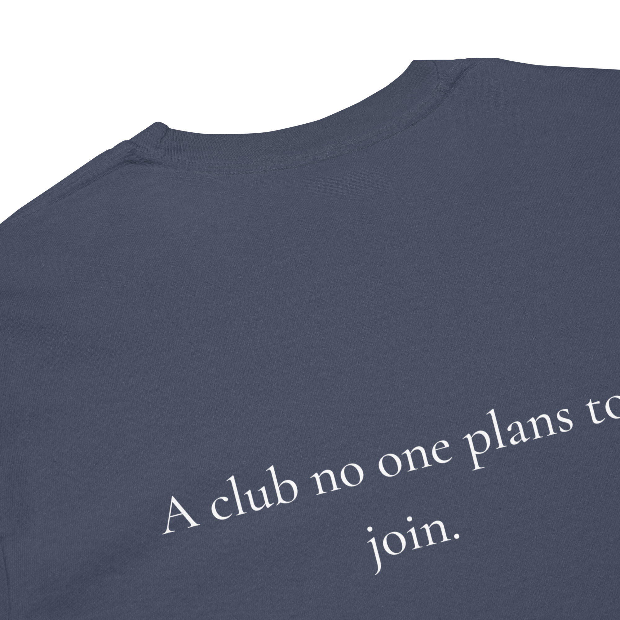 Close-up of the NICU Mom Club message on a navy shirt reading, “A club no one plans to join.”
