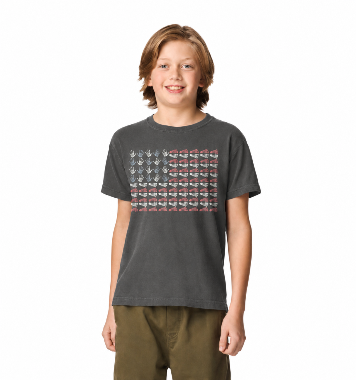 Boy modeling the Pepper Tiny Hands, Tiny Feet, Big Courage NICU youth T-shirt.