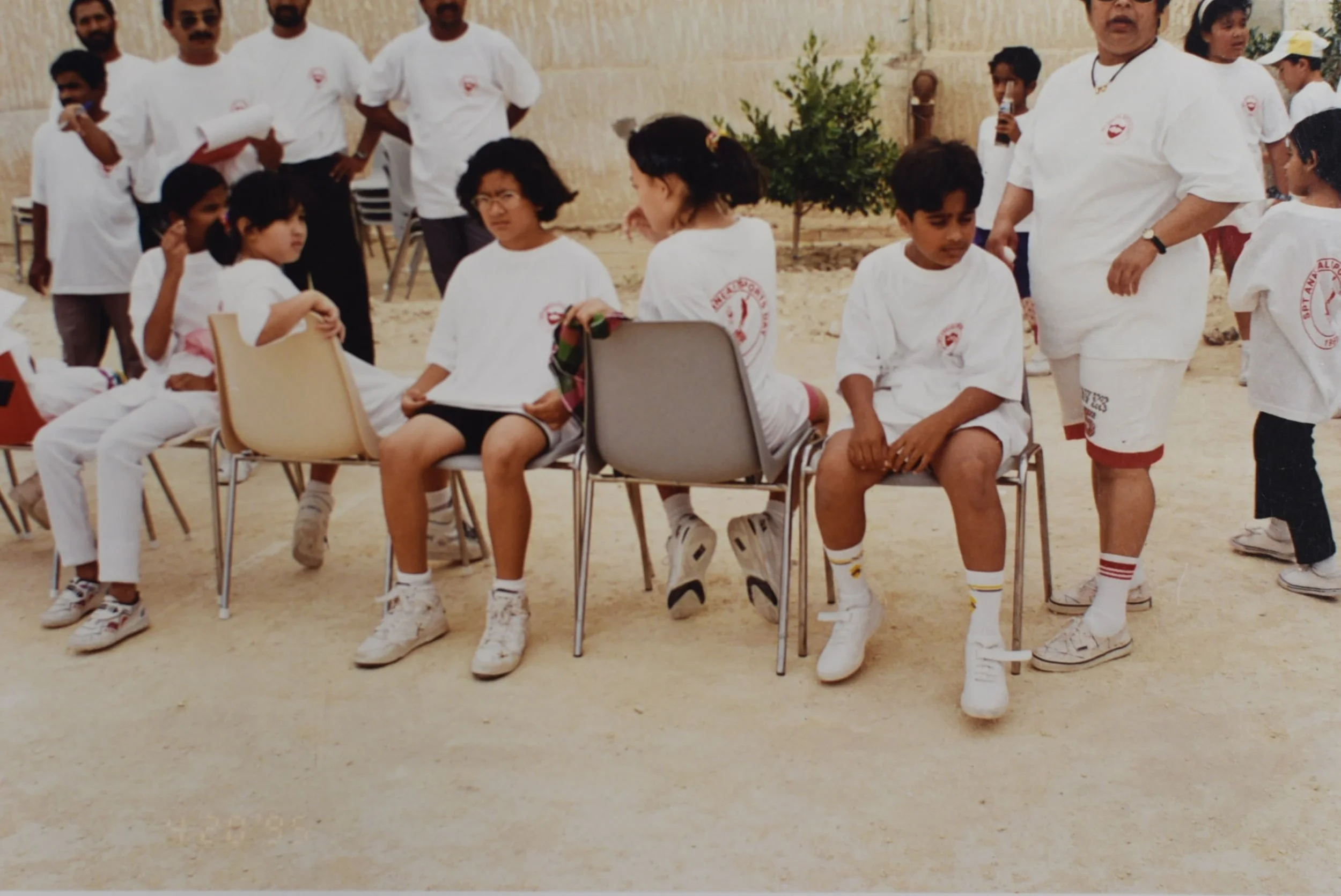 Samantha Juan attending a childhood sports event with other children and adults in Bahrain.