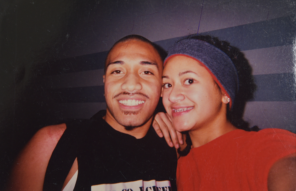 Samantha Juan smiling with a friend during a military recruiting event in California.