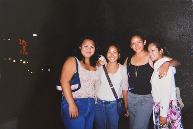 Samantha Juan posing with friends at night during a military recruiting event in California.