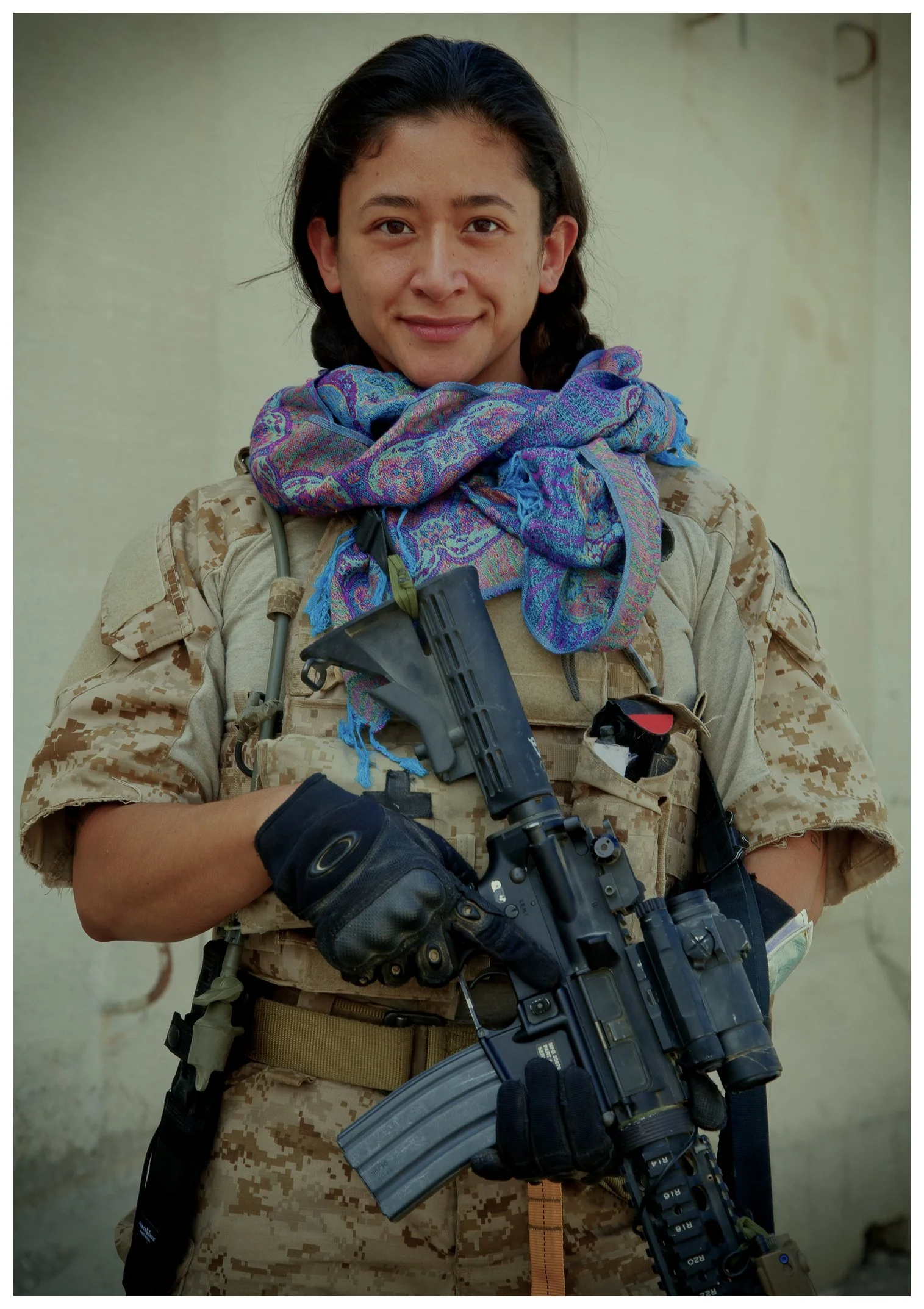 Samantha Juan wearing a U.S. Army camouflage uniform and tactical gear while serving in Afghanistan.