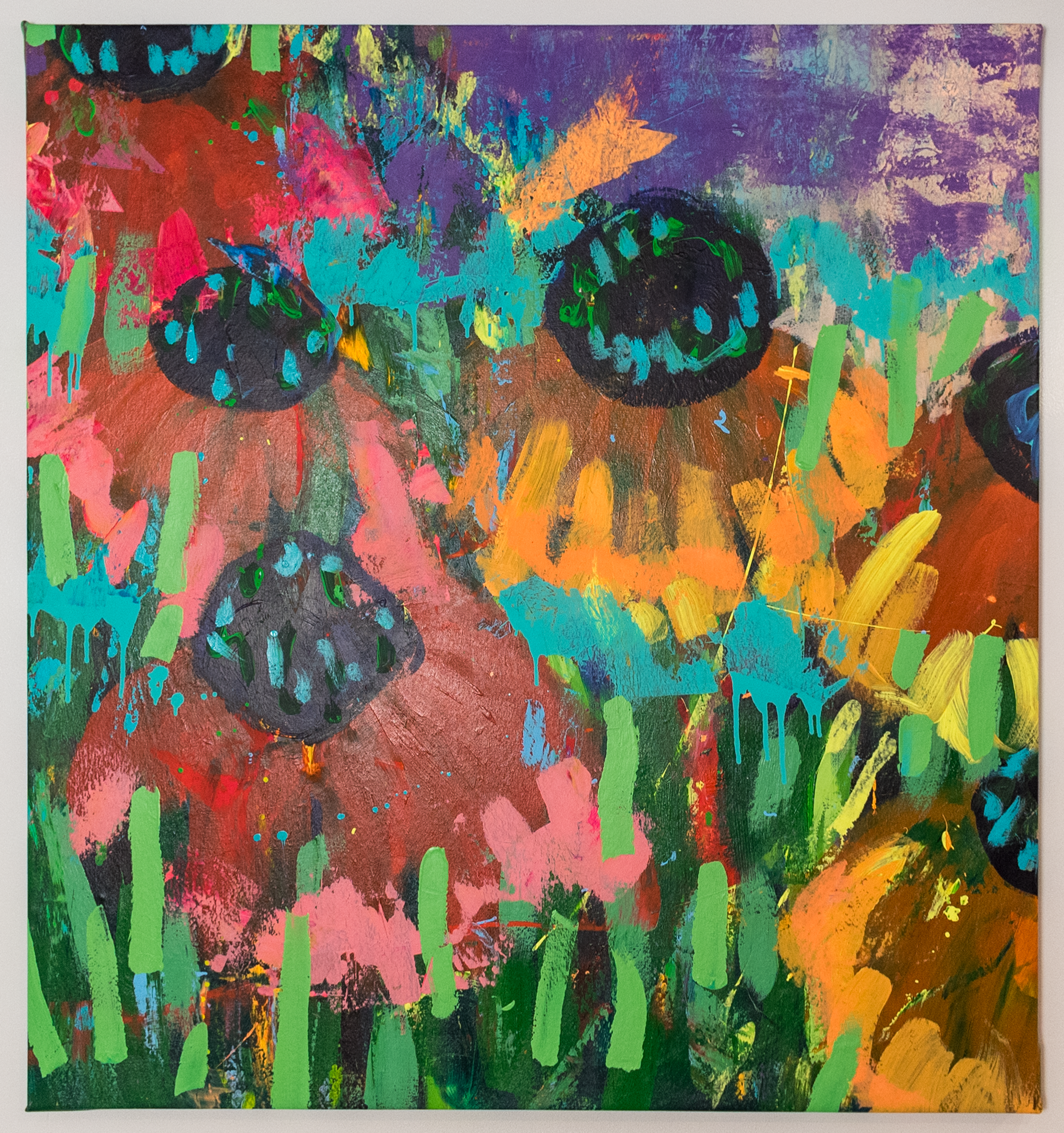 Abstract colorful painting with splashes of bright colors including green, yellow, pink, purple, blue, black, red, and orange on a canvas with a textured surface.