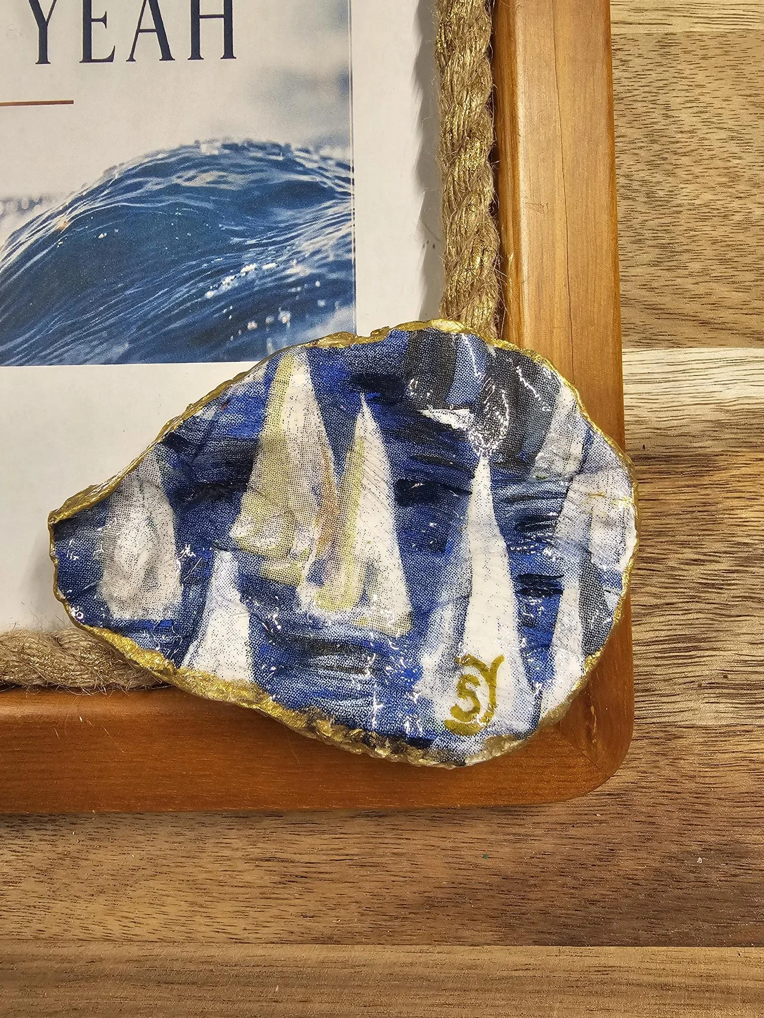 Wood Fram with Rope Oyster Shell with Sail Boats Closeup.jpg