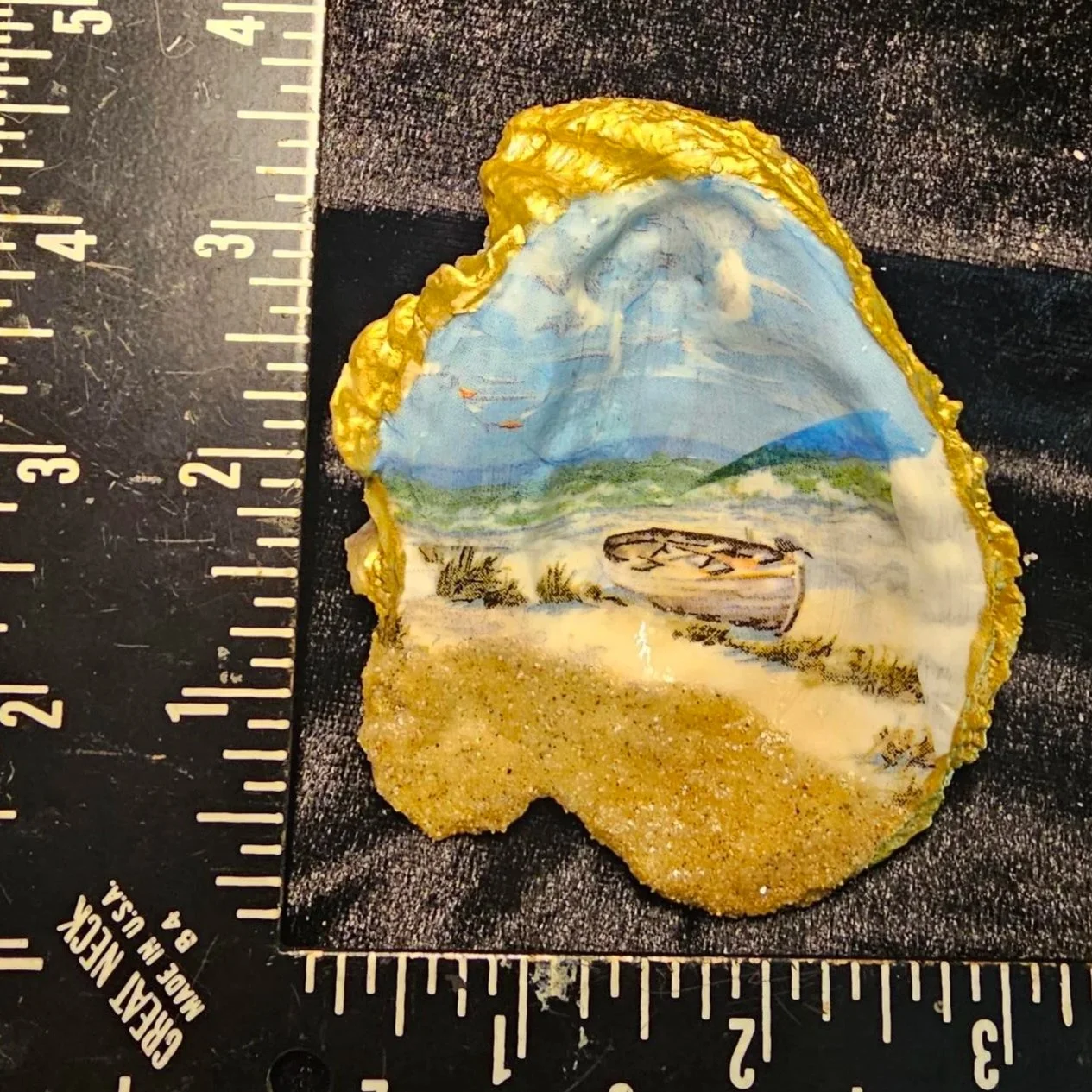 shell-yeah-Boat-a-shore-with-sand-front.jpg