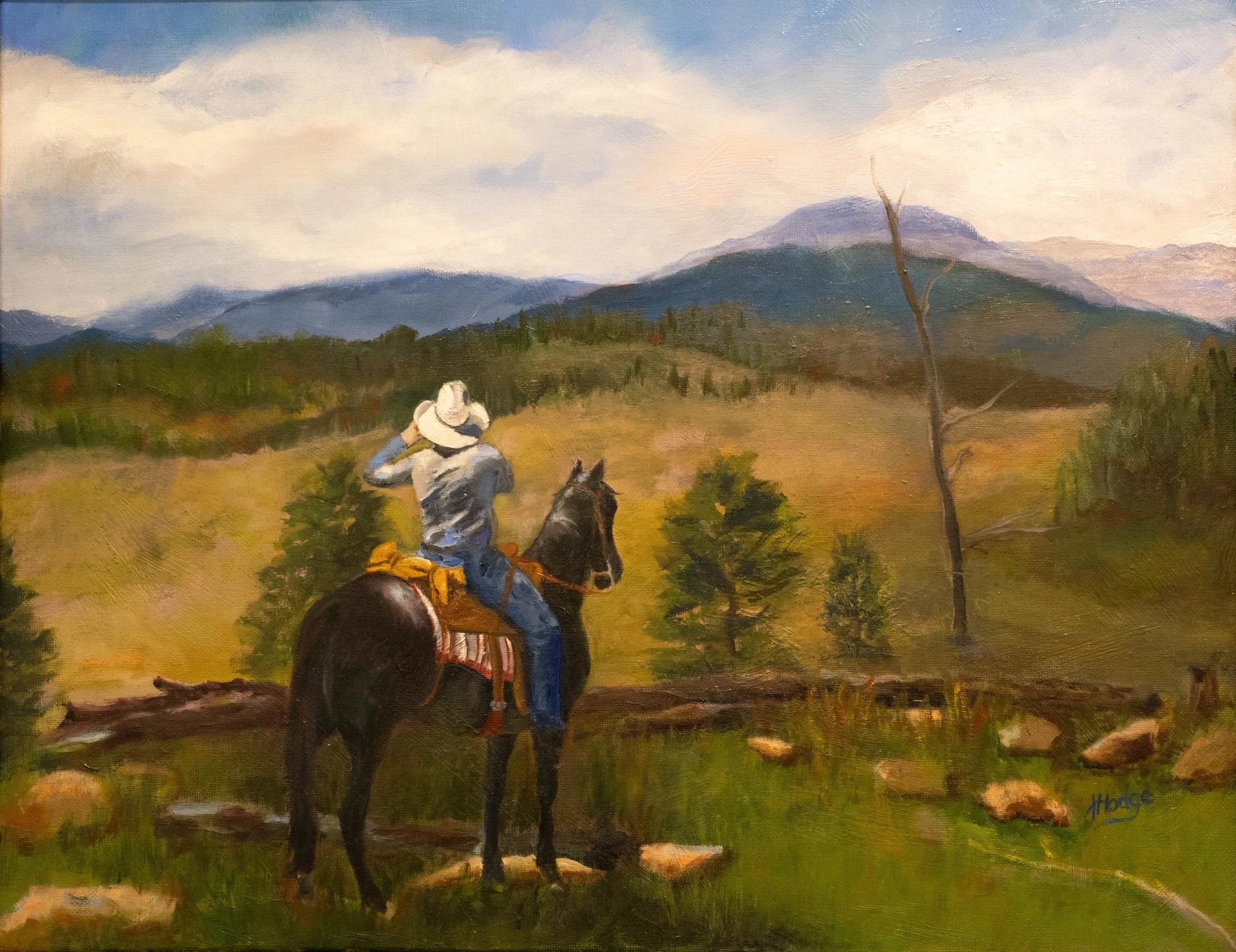 A landscape painting of a mountain range with a cloudy sky, trees, and a person riding a horse in the foreground.
