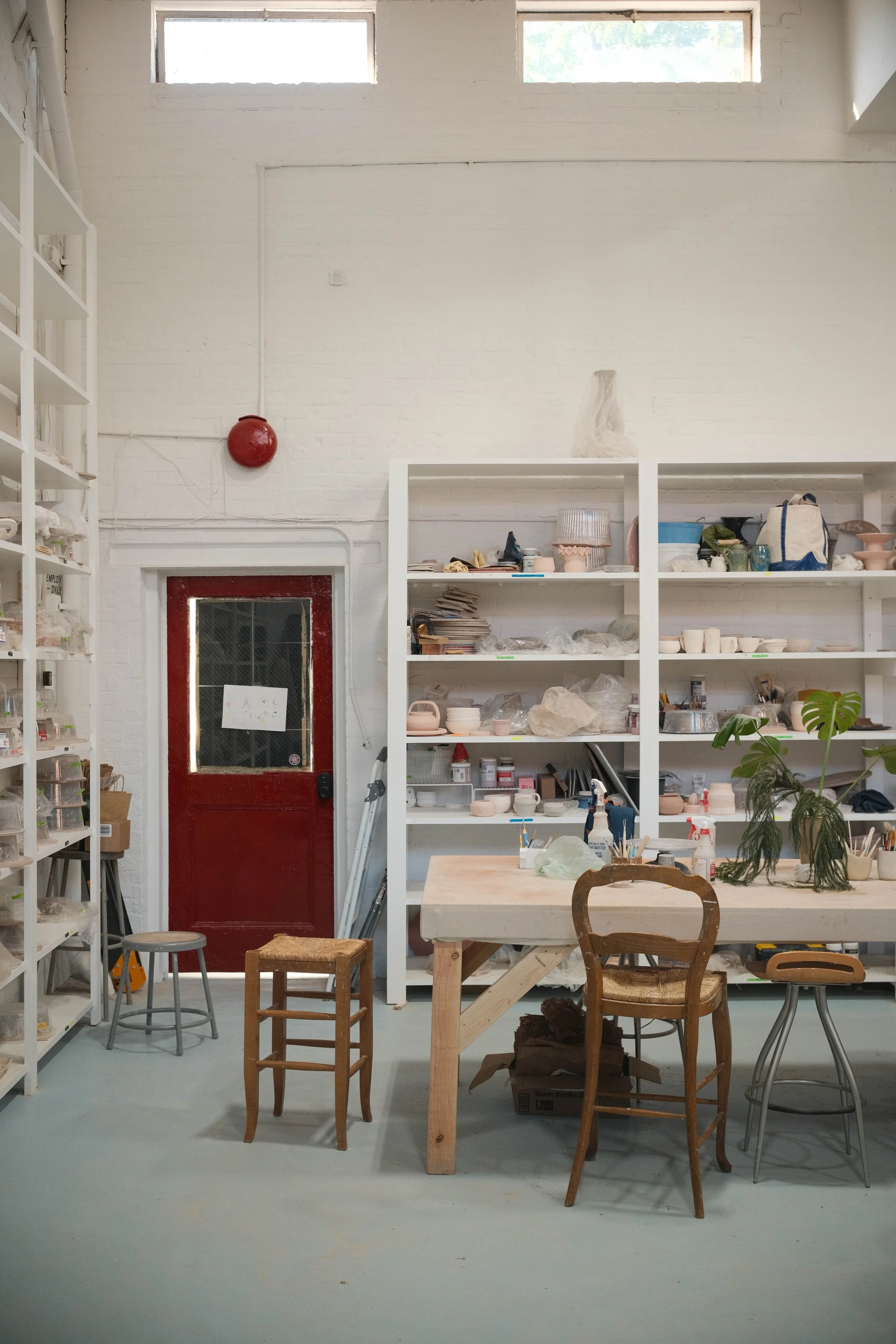 Member and class shelving surround our main working table