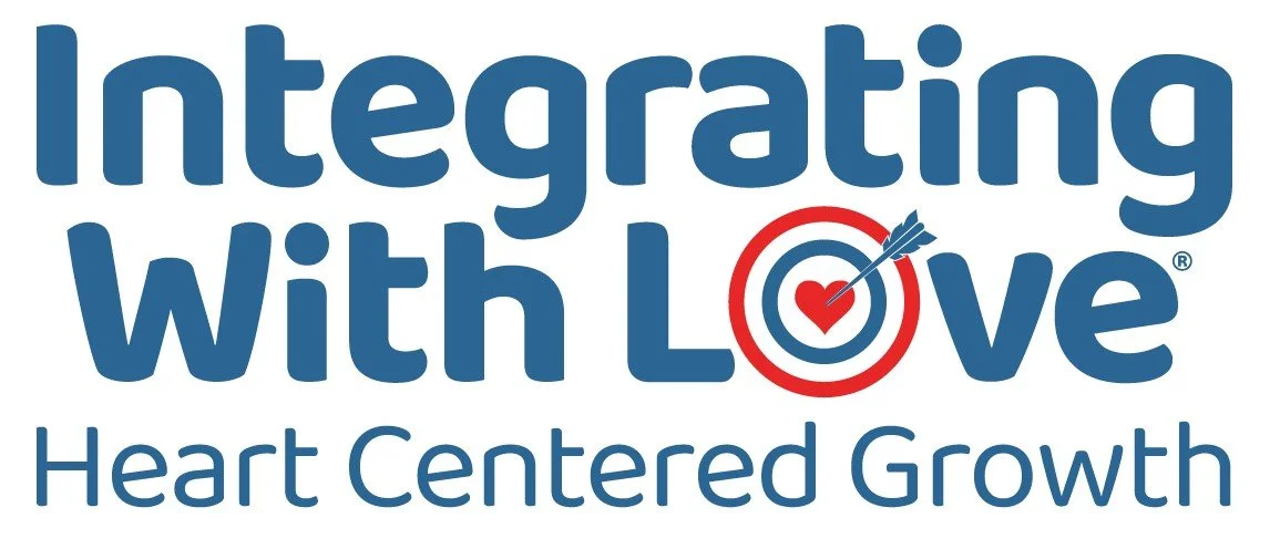 Logo with text "Integrating With Love" and "Heart Centered Growth," featuring a heart and arrow target design.