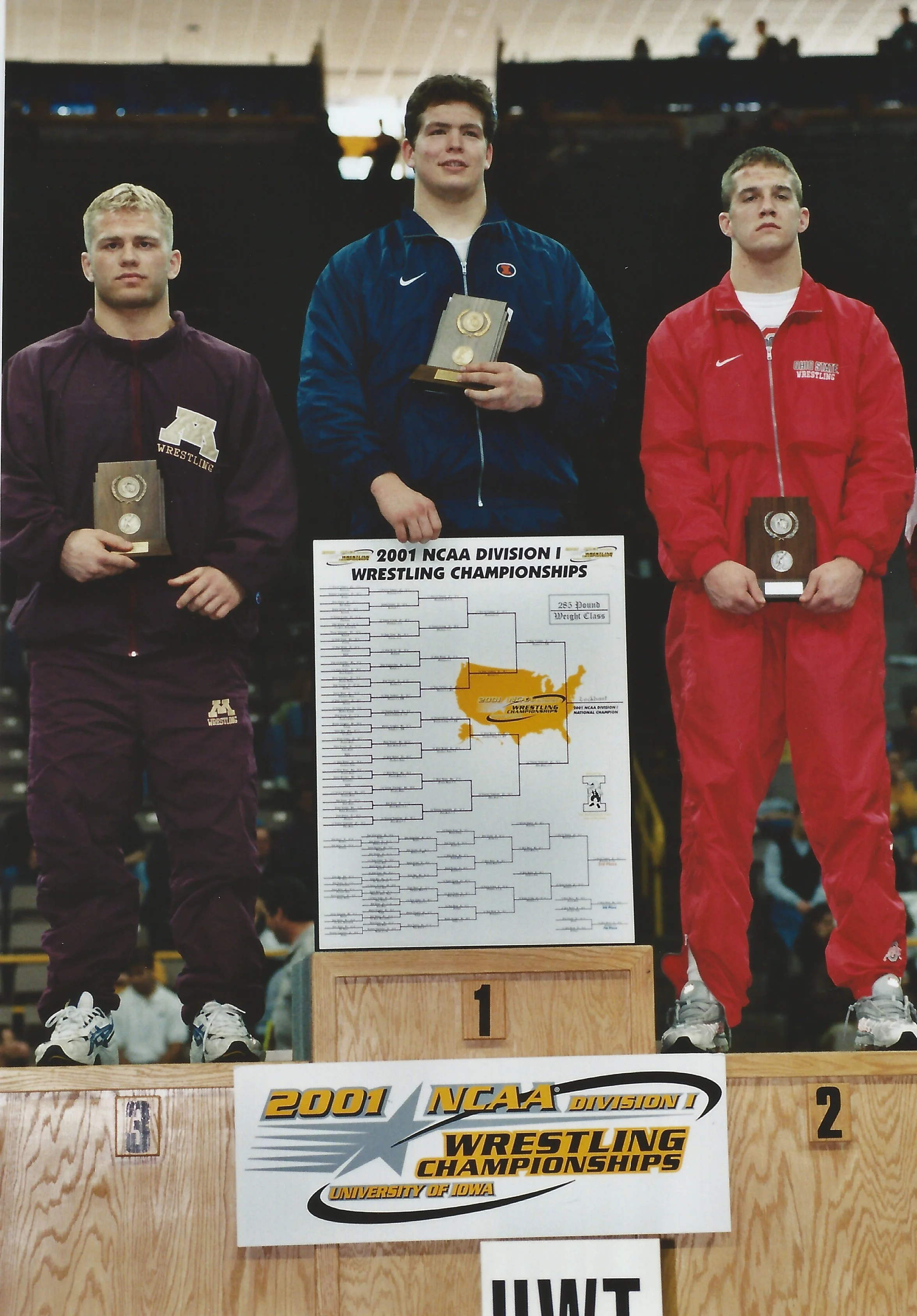 2001 NCAA Division I Wrestling Championships, holding plaques.  John Lockhart was NCAA Champion in 2001 followed by runner-up Tommy Rowlands and 3rd Pl., Garrett Lowney.
