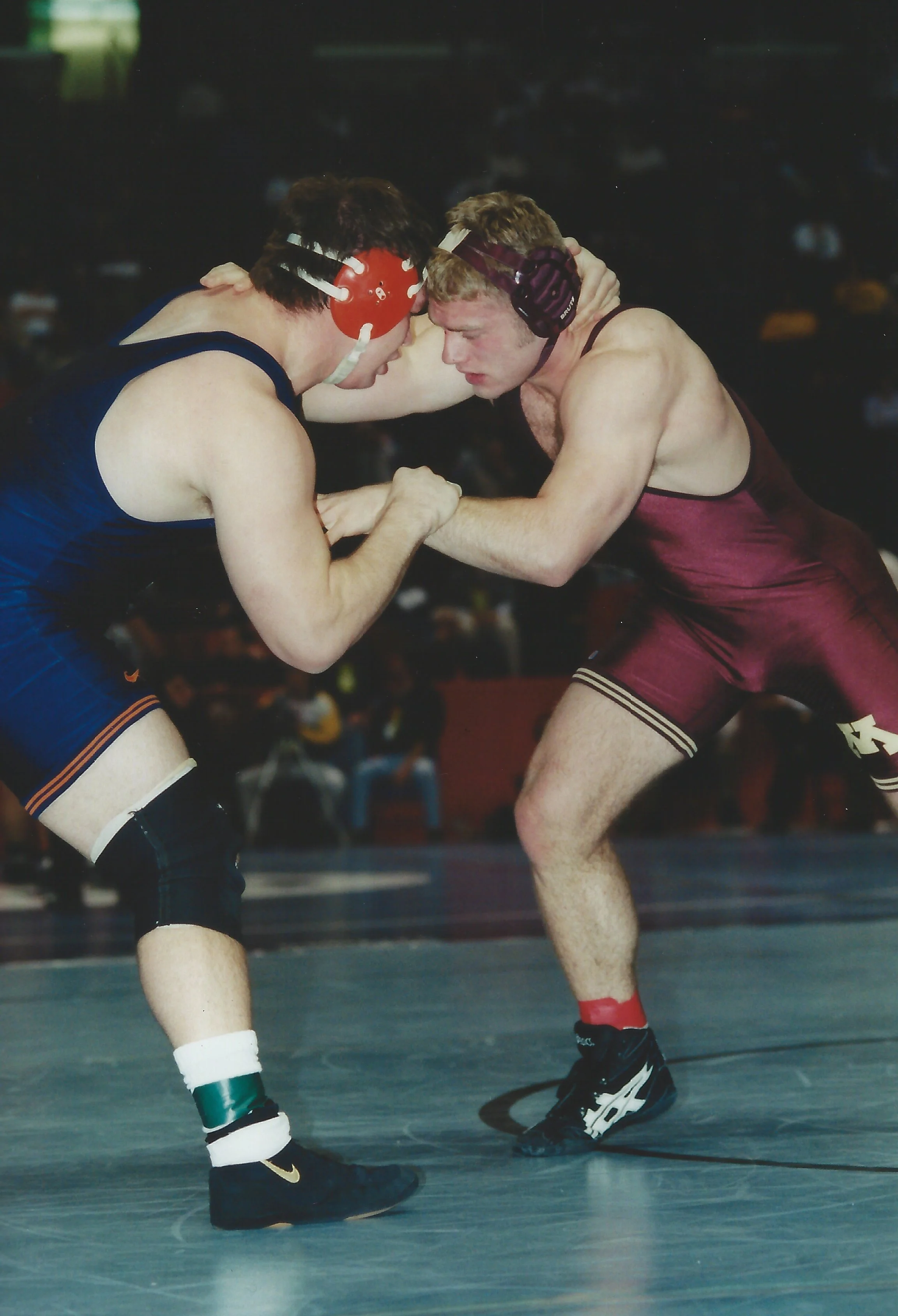 John Lockhart seen here hand fighting with Olympian Garrett Lowney at the NCAA championship tournament.  