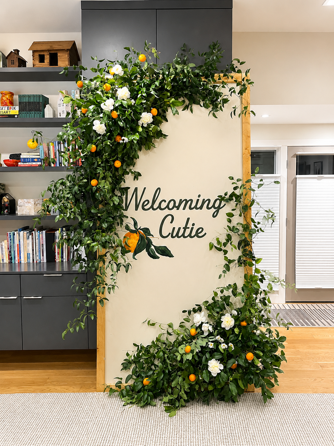 Wall with hand painted graphic, greenery and florals | Designer, fabricator, installer | Client Project