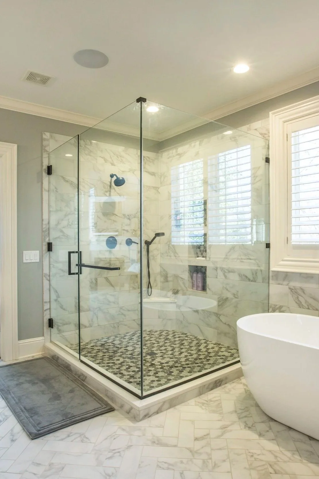 Oversized glass shower enclosure