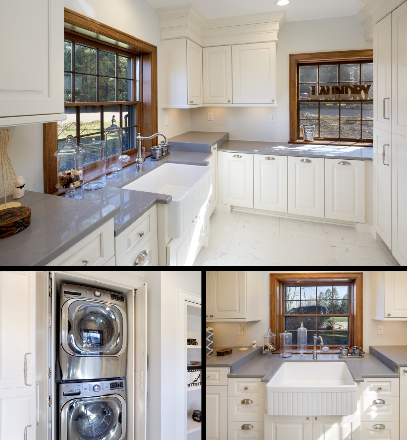 Bright laundry room with white cabinets, a gray countertop, a farmhouse sink under two windows with wooden frames, and a stacked washer and dryer. Decor includes glass jars, a small lamp, and a decorative 'LAUNDRY' sign on the window.