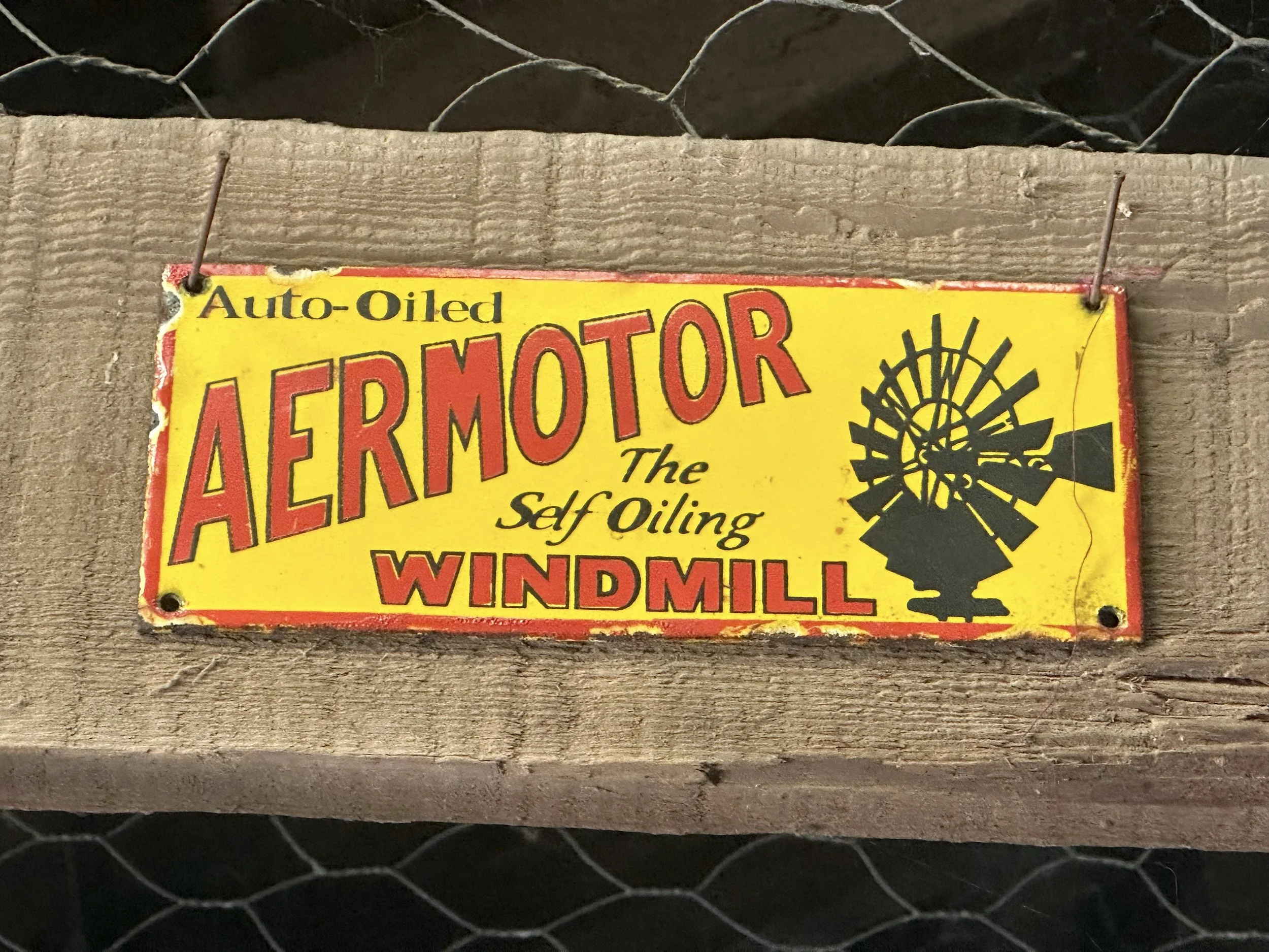 Small Enamel “Aeromotor” Windmill Company Plaque.