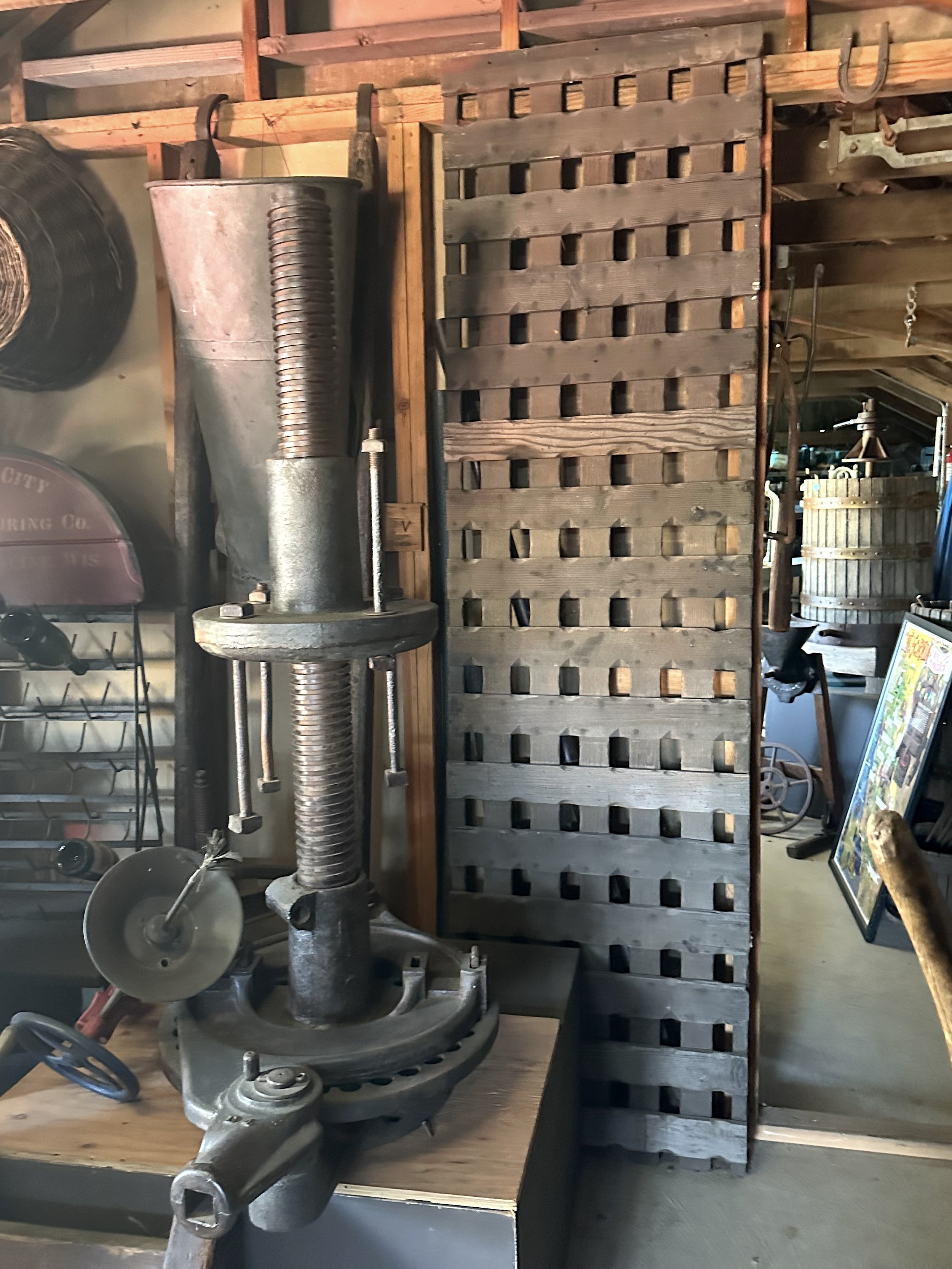A wooden rack with symmetrically placed square holes.