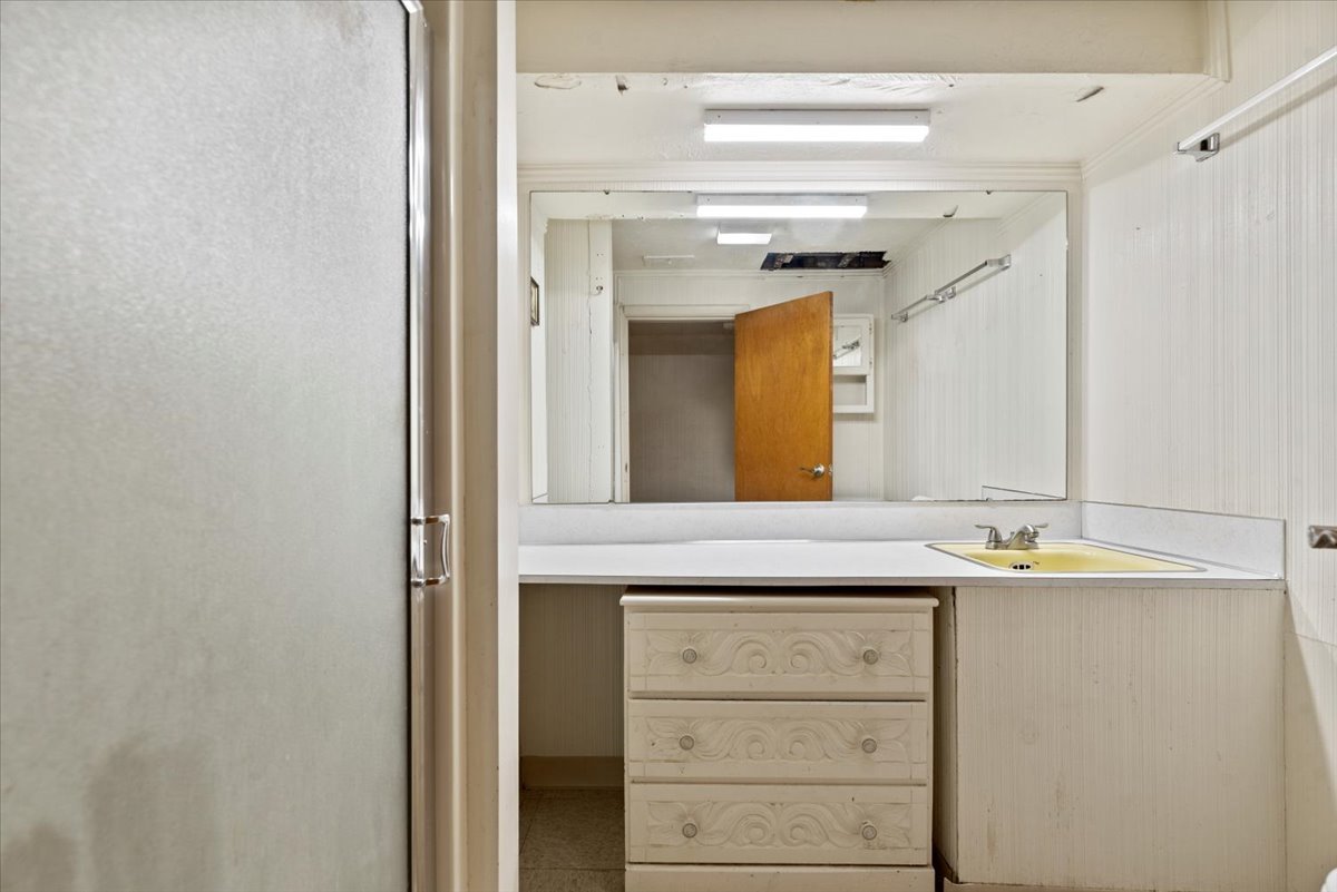 Before · The original basement bathroom.