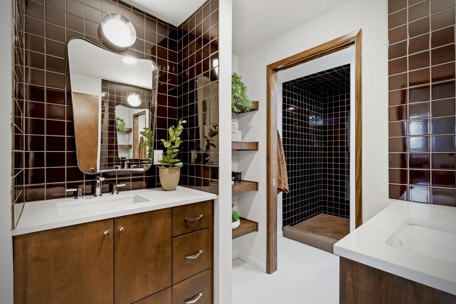 Two offset vanities provide separate places to get ready.