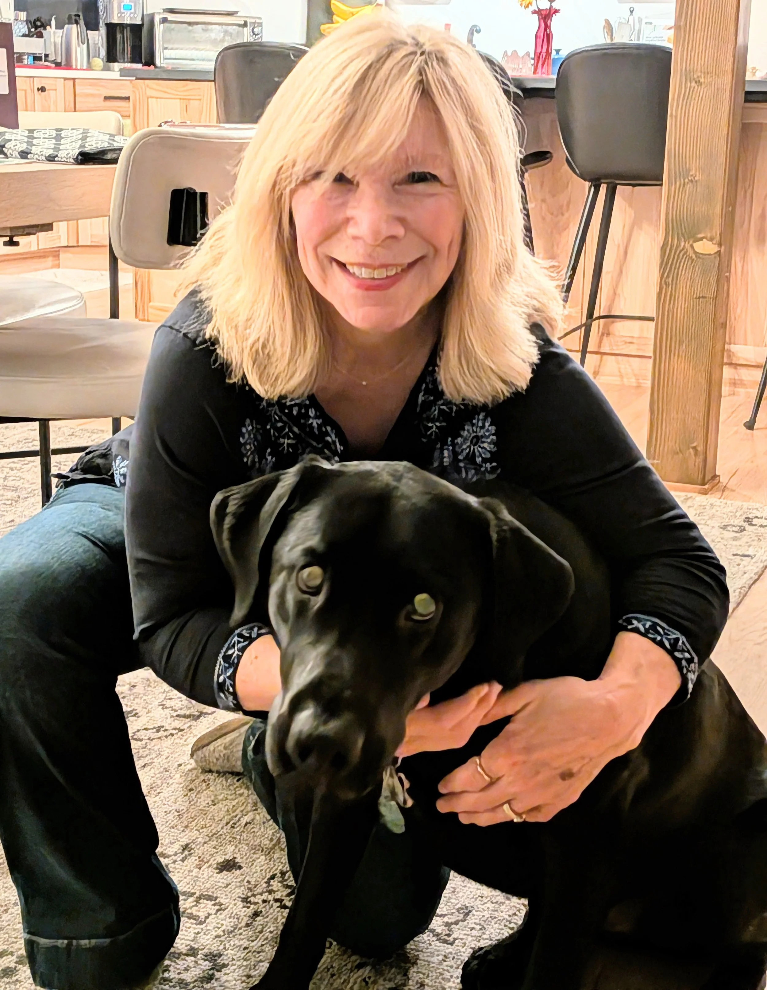 image of a woman hugging her dog
