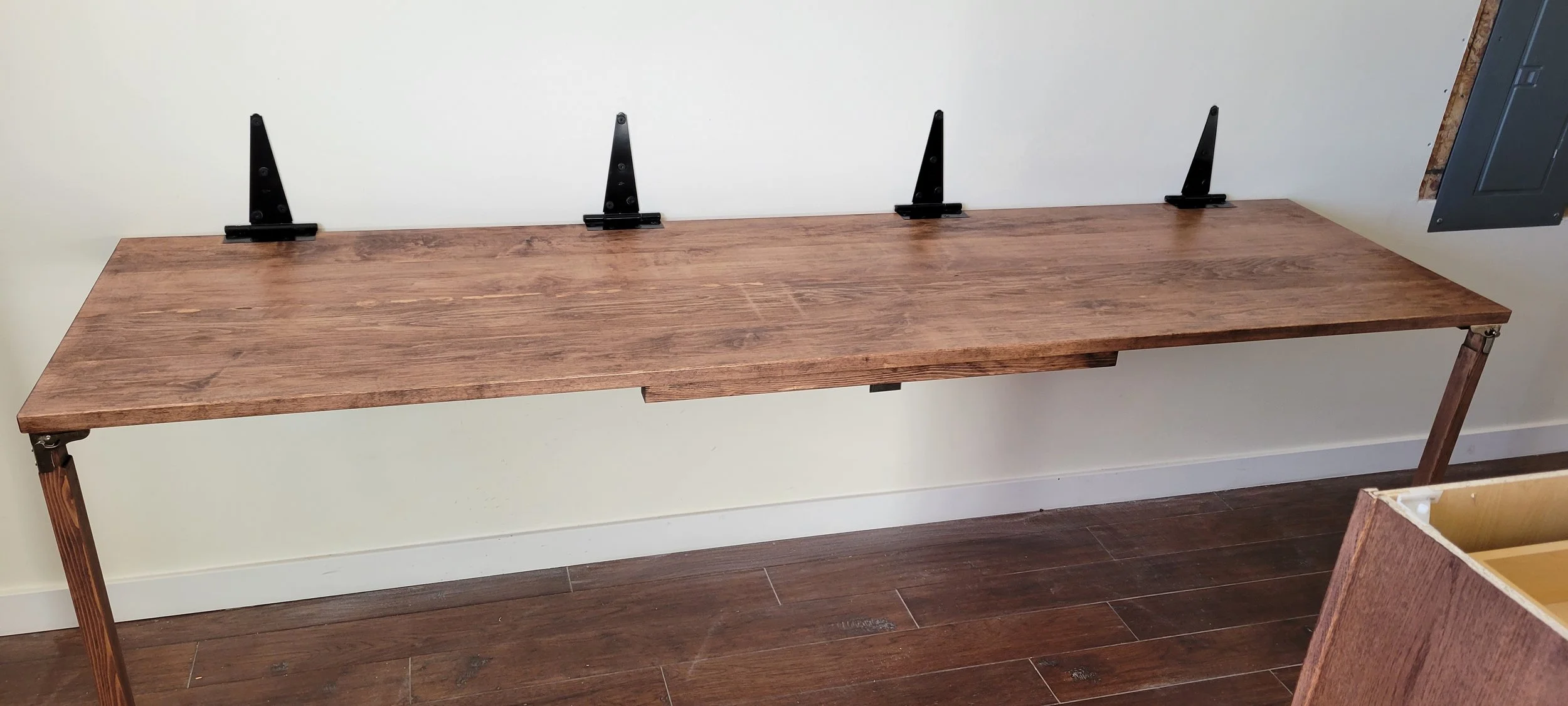 Custom milled soft maple fold-up table stained and finished