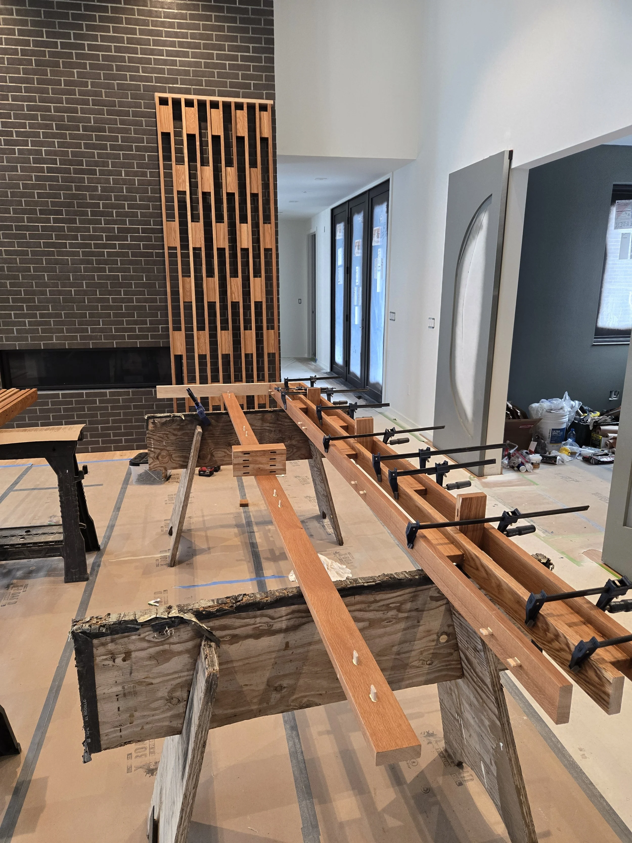Custom milled white oak feature wall in progress