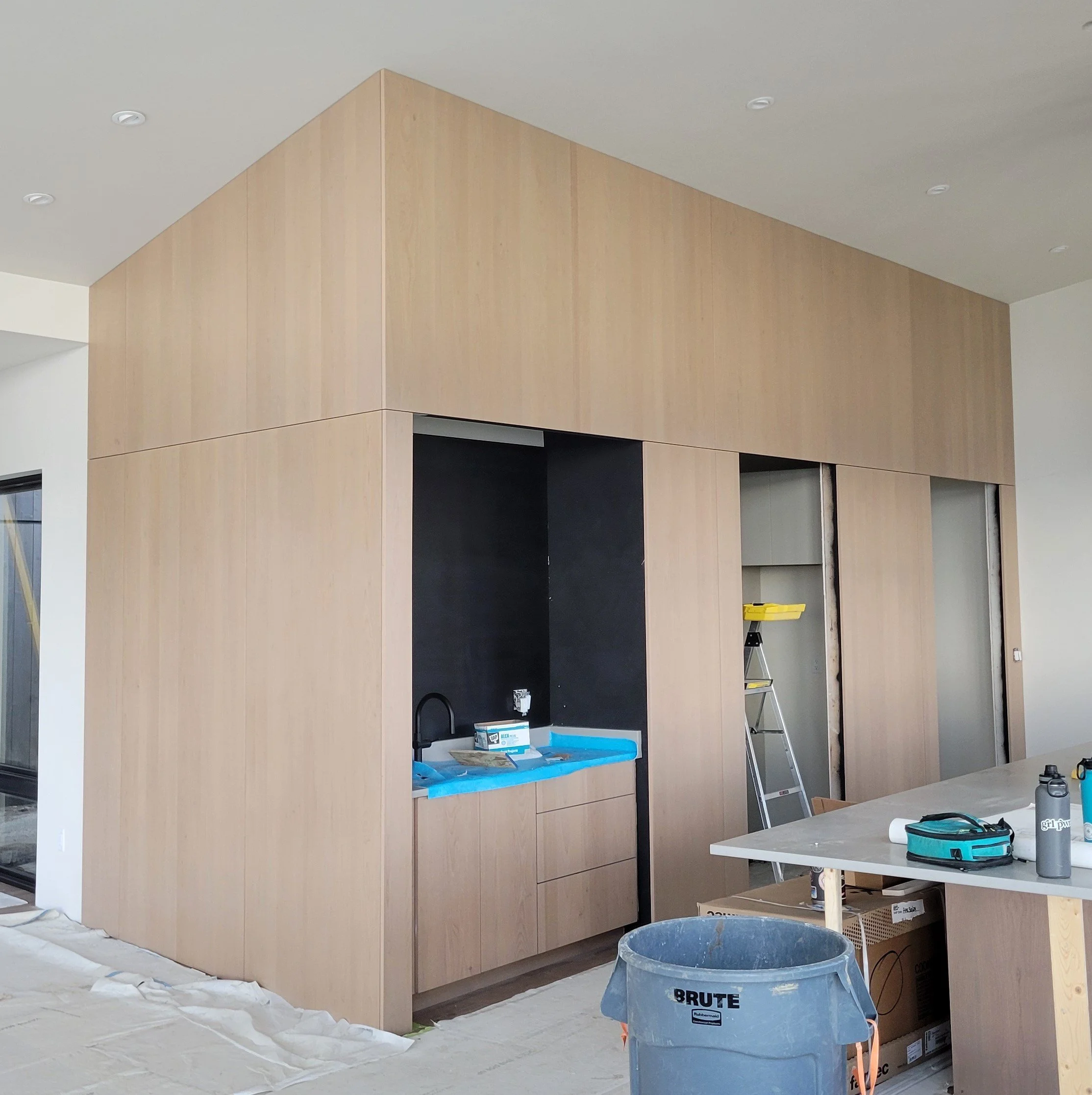 Custom Plywood paneling edgebanded and glued to the wall