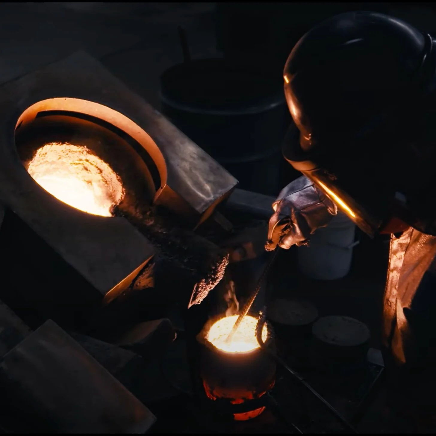 Molten metal poured into a crucible