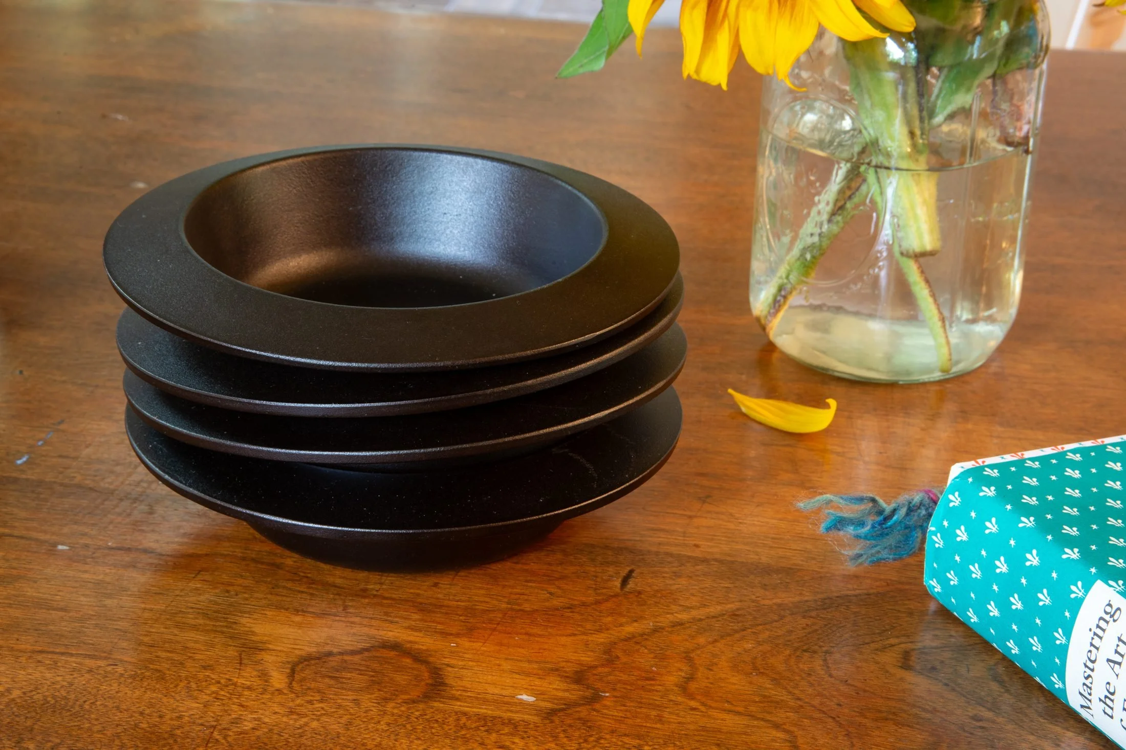 A stack of cast iron cazuelas by Borough Furnace