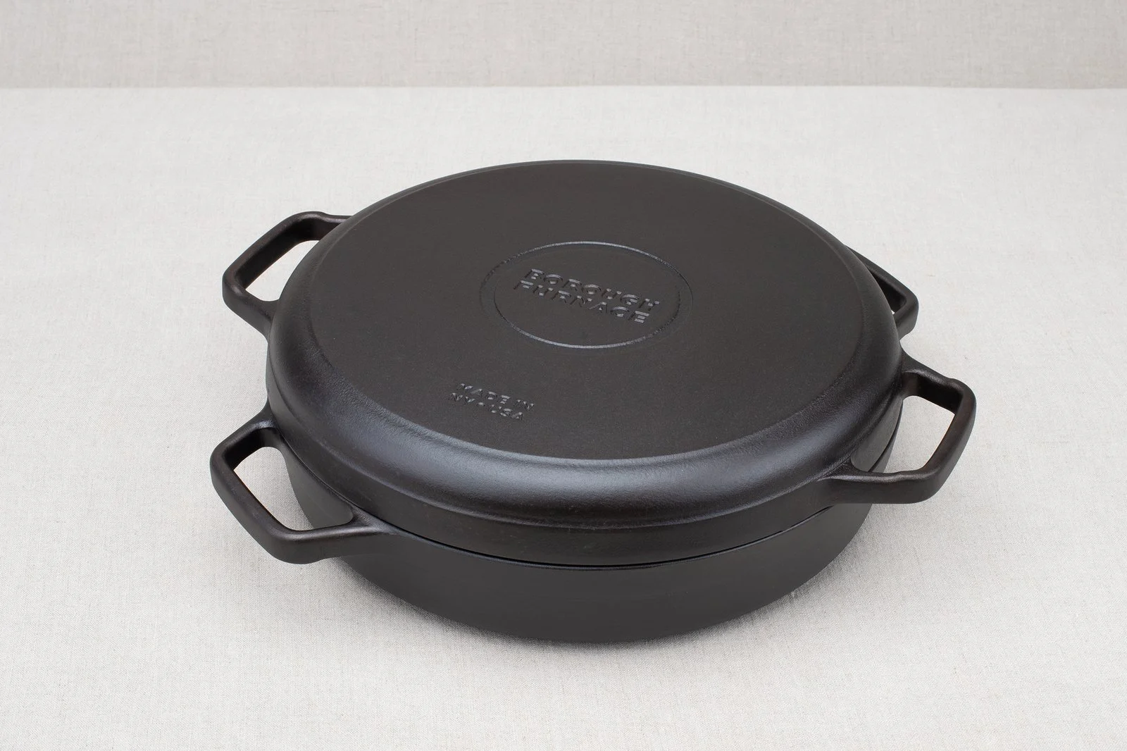 Borough Furnace 12-inch braising skillet with grill pan braising lid stacked on top