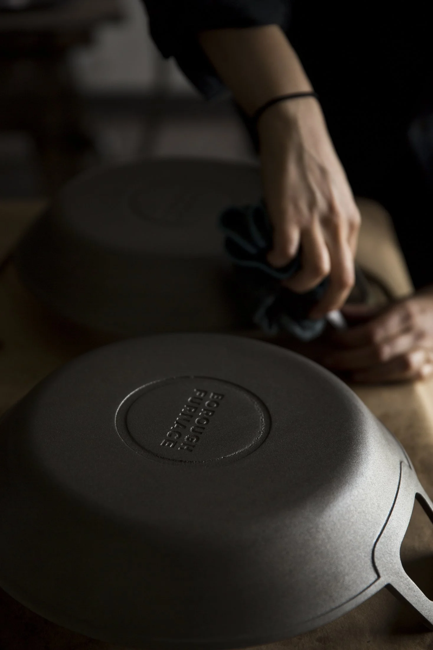 Seasoning a Borough Furnace cast iron skillet by hand with organic flax oil