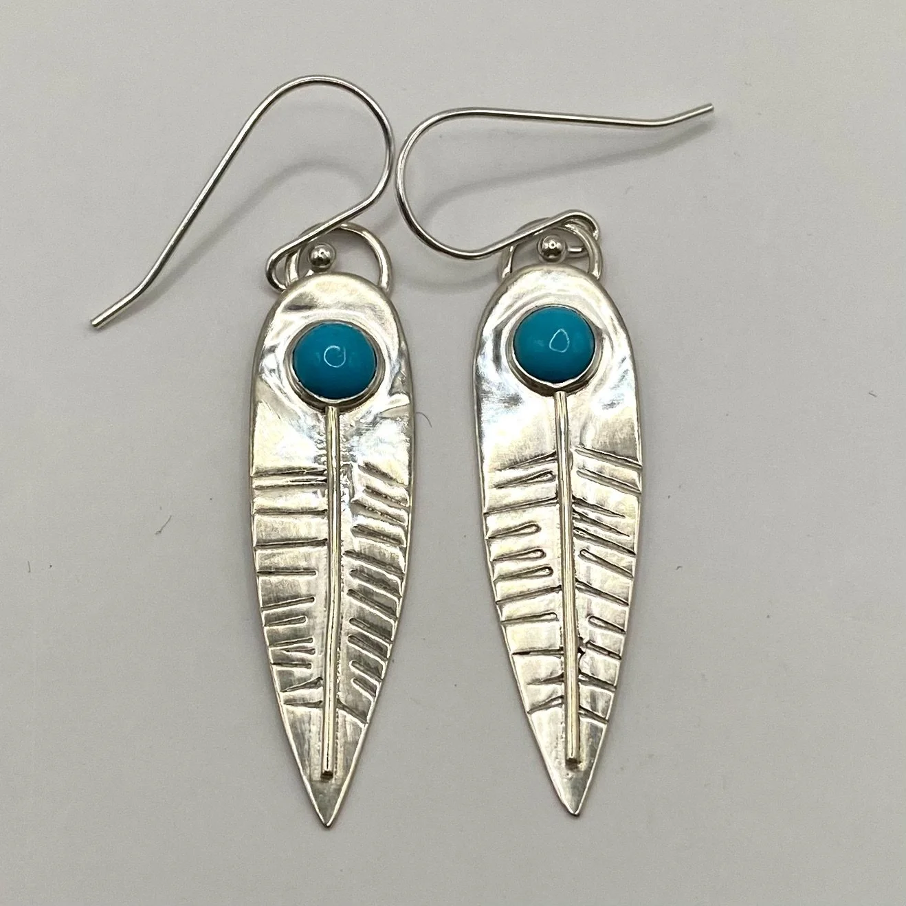 Sterling Silver Feather Earrings with Turquoise Cabochon