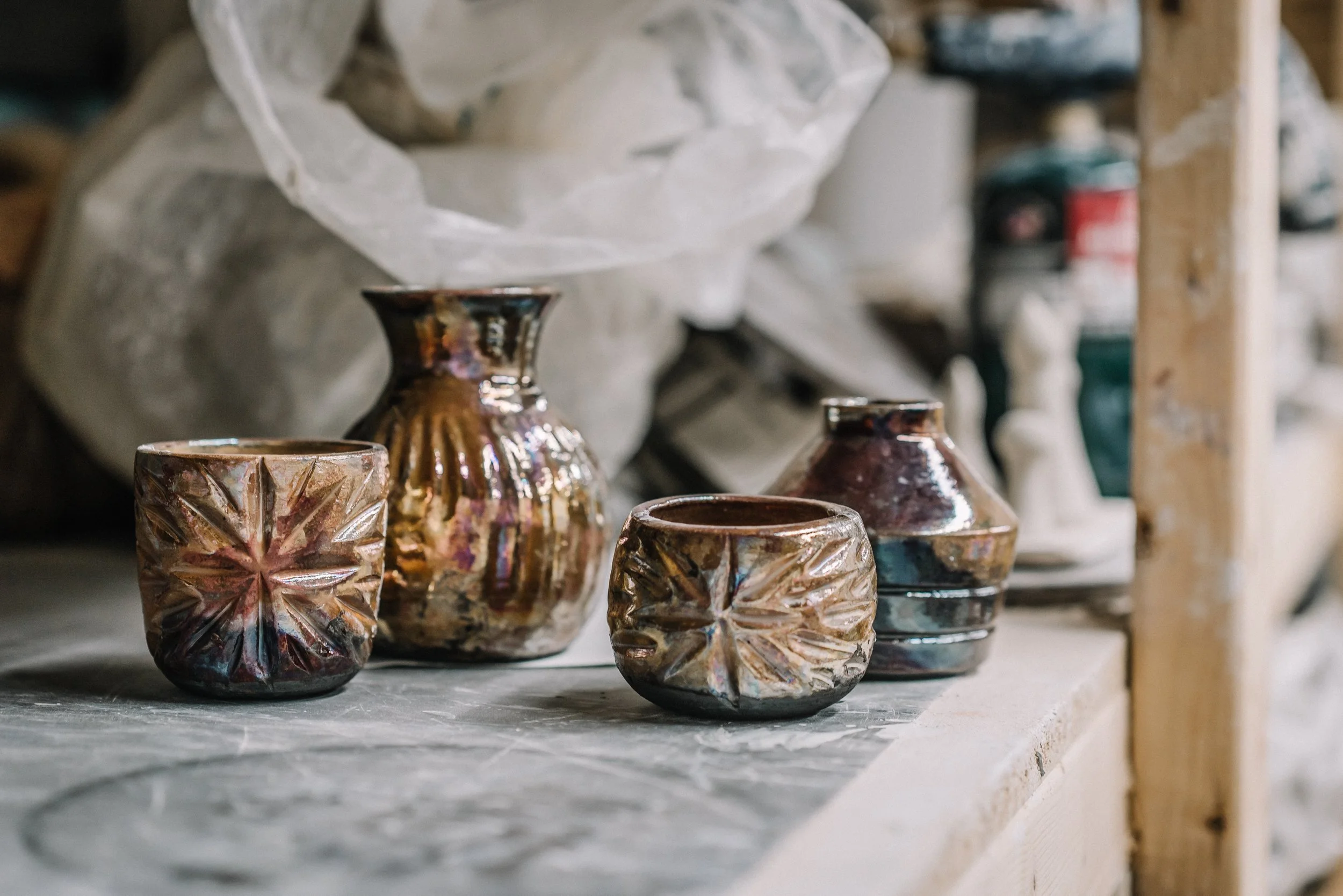 Beautiful Raku fired pottery taught at a workshop at River City Clay in Richmond, Virginia