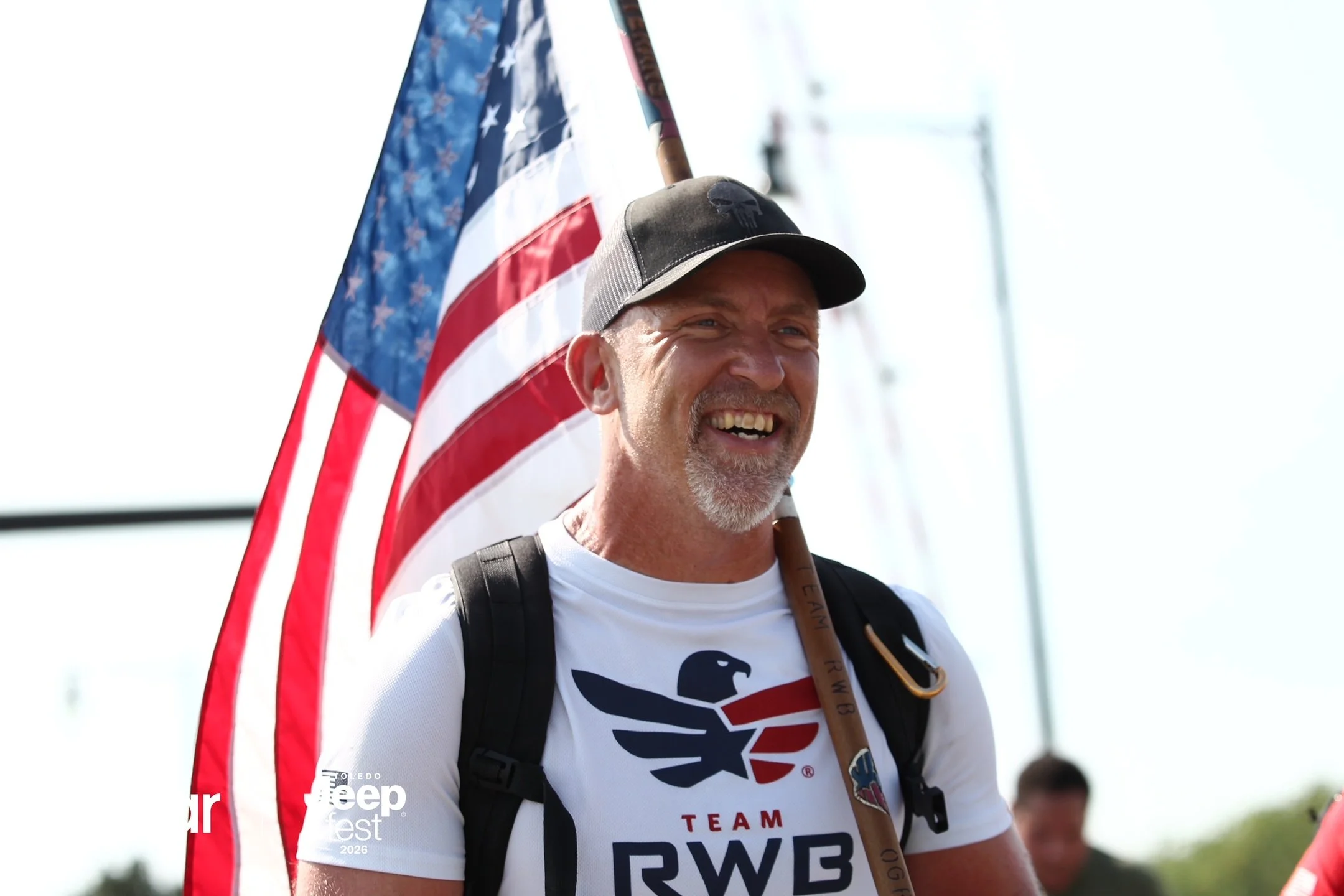 USAA promotional graphic with patriotic shield and text 'One Flag Forward'.