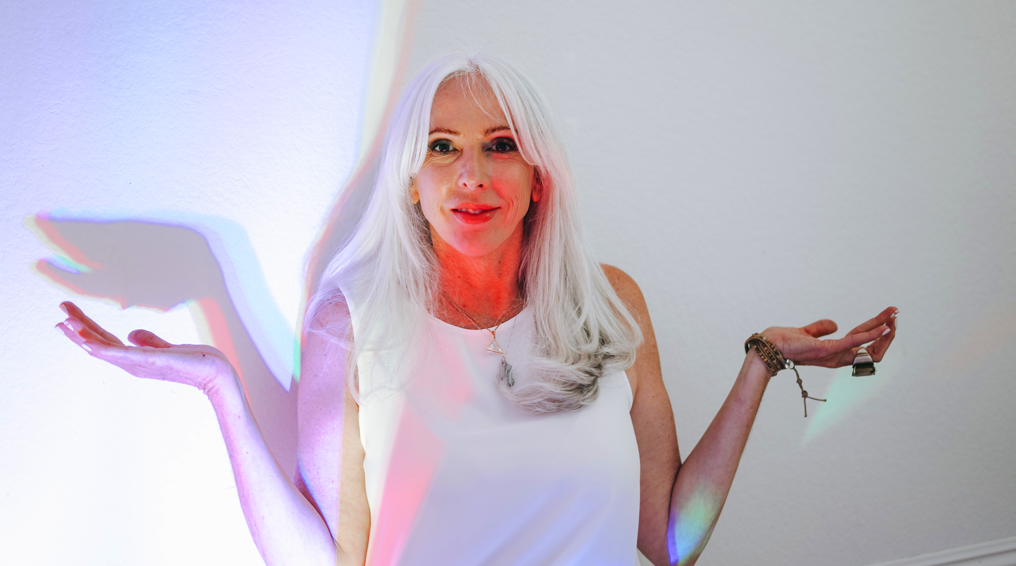 Arden Reece with rainbow light - color mystic and intuitive guidance