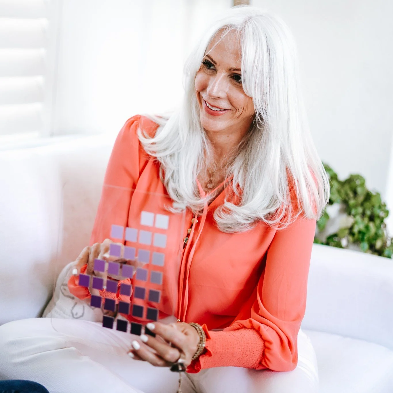 Arden Reece with Munsell color cards for color wisdom and spiritual guidance