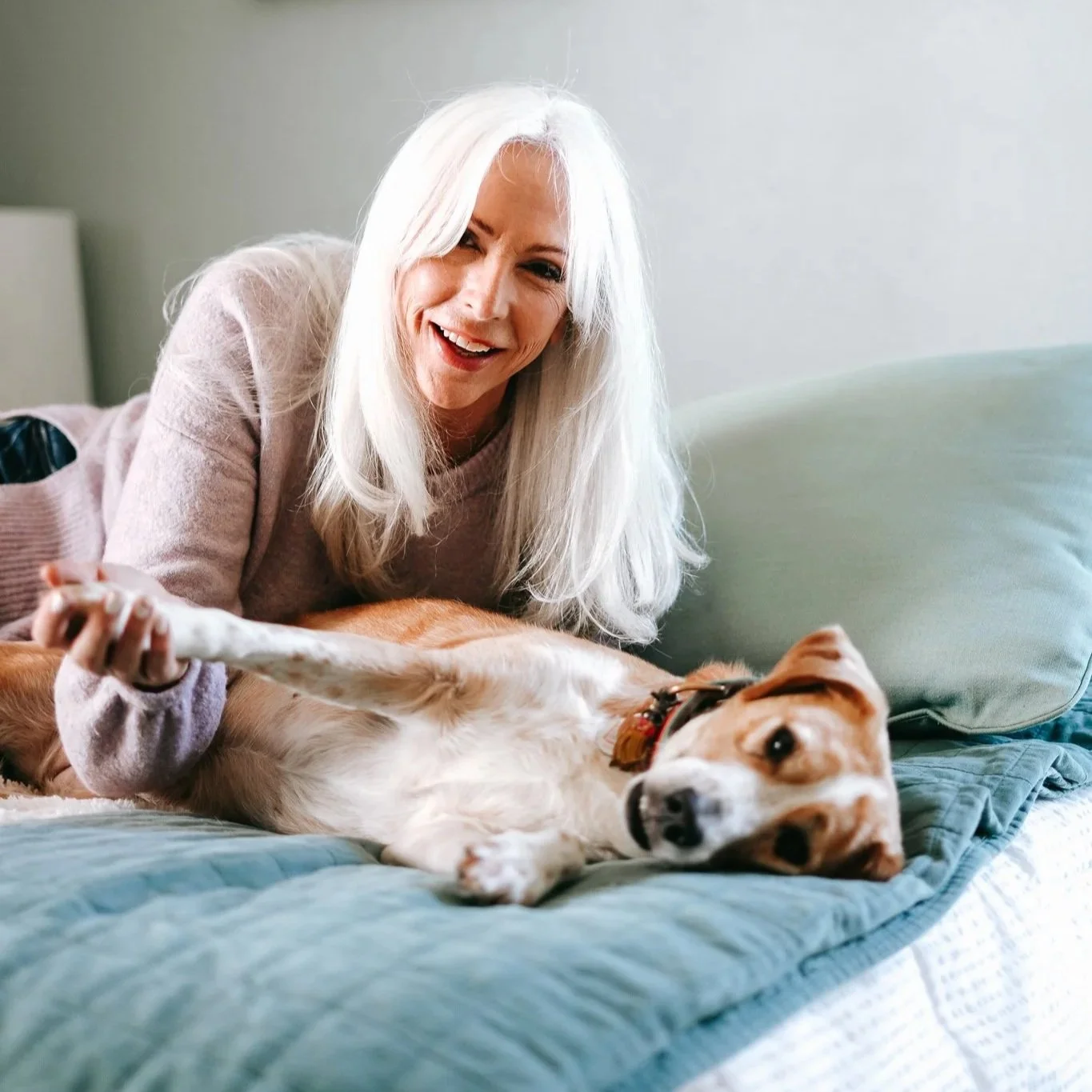 Arden Reece with her dog, reflecting her love of animal rights and dog rescue