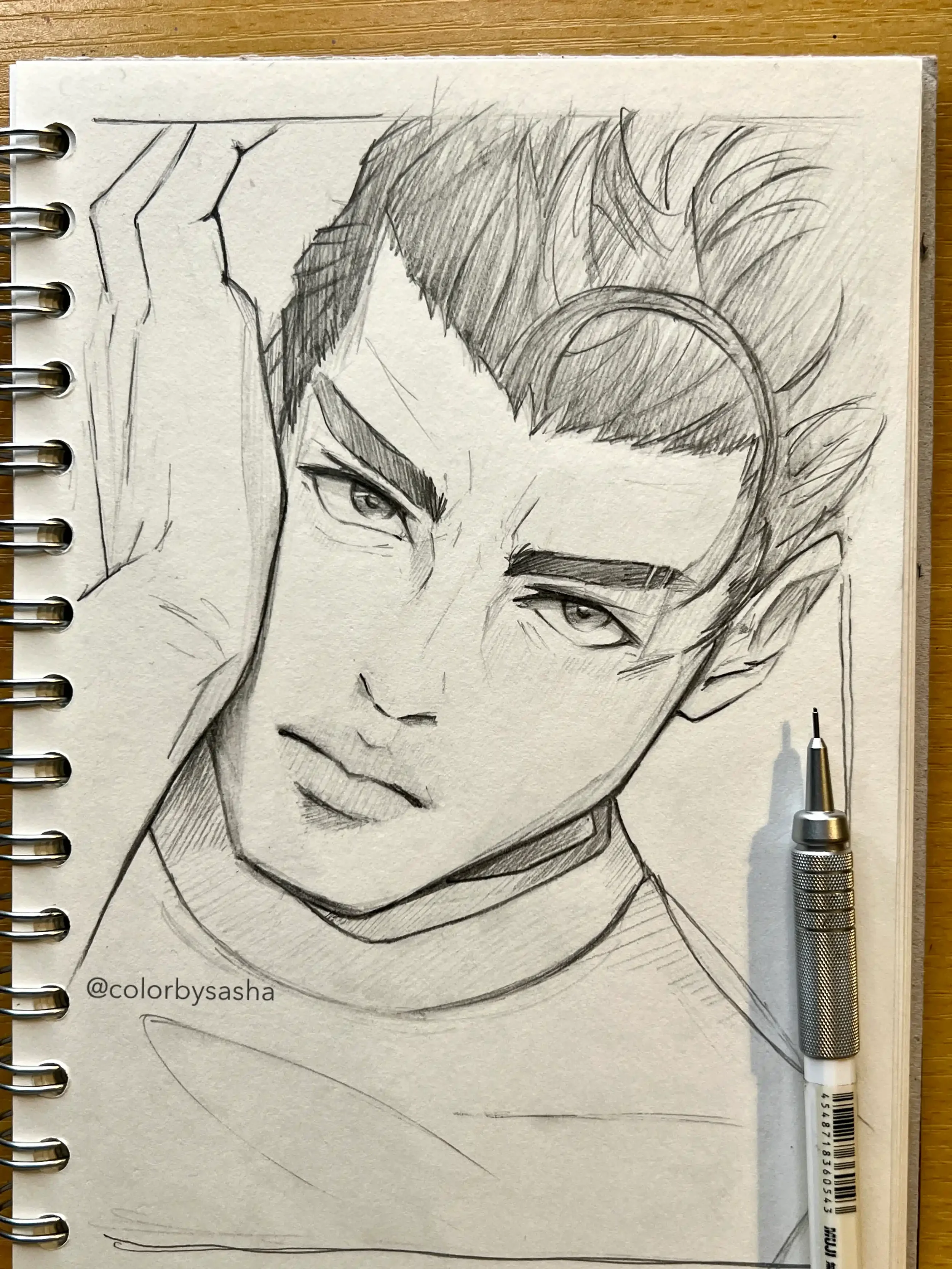 Close-up anime sketch drawing of a male character, demonstrating manga art and portrait illustration skills.