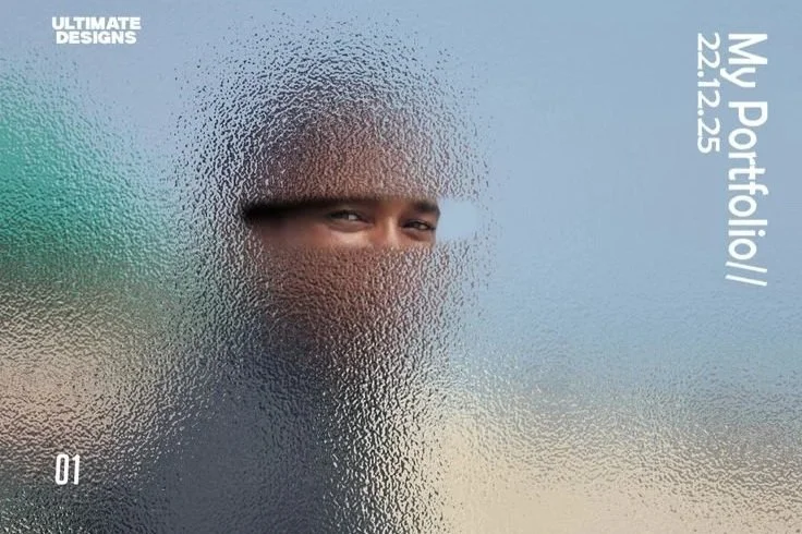 A person's face is seen through a frosted glass or plastic surface, creating a blurred and textured effect. The person's eyes and part of their face are visible. Text on the right side reads 'My Portfolio 22.12.25', and top left says 'Ultimate Designs' with a small '01' at the bottom.