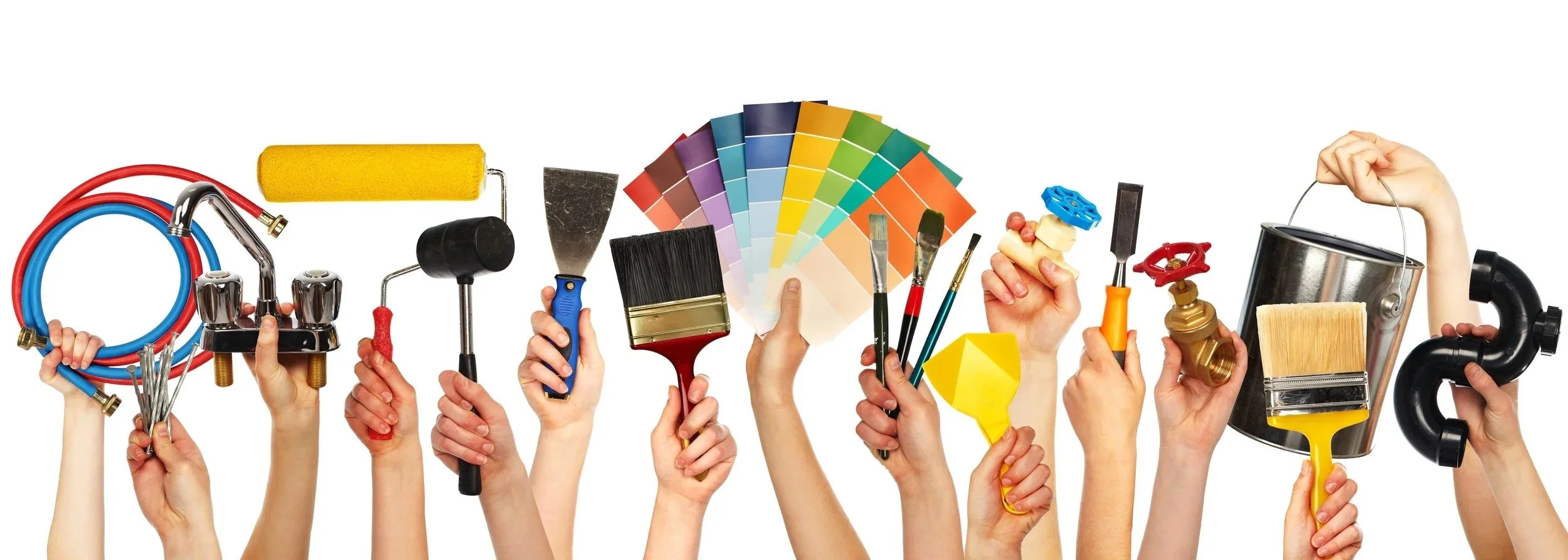 Multiple hands holding various painting tools and supplies, including paintbrushes, paint rollers, a paint sample fan deck, a paint can, hoses, a scraper, a valve, and other painting accessories.