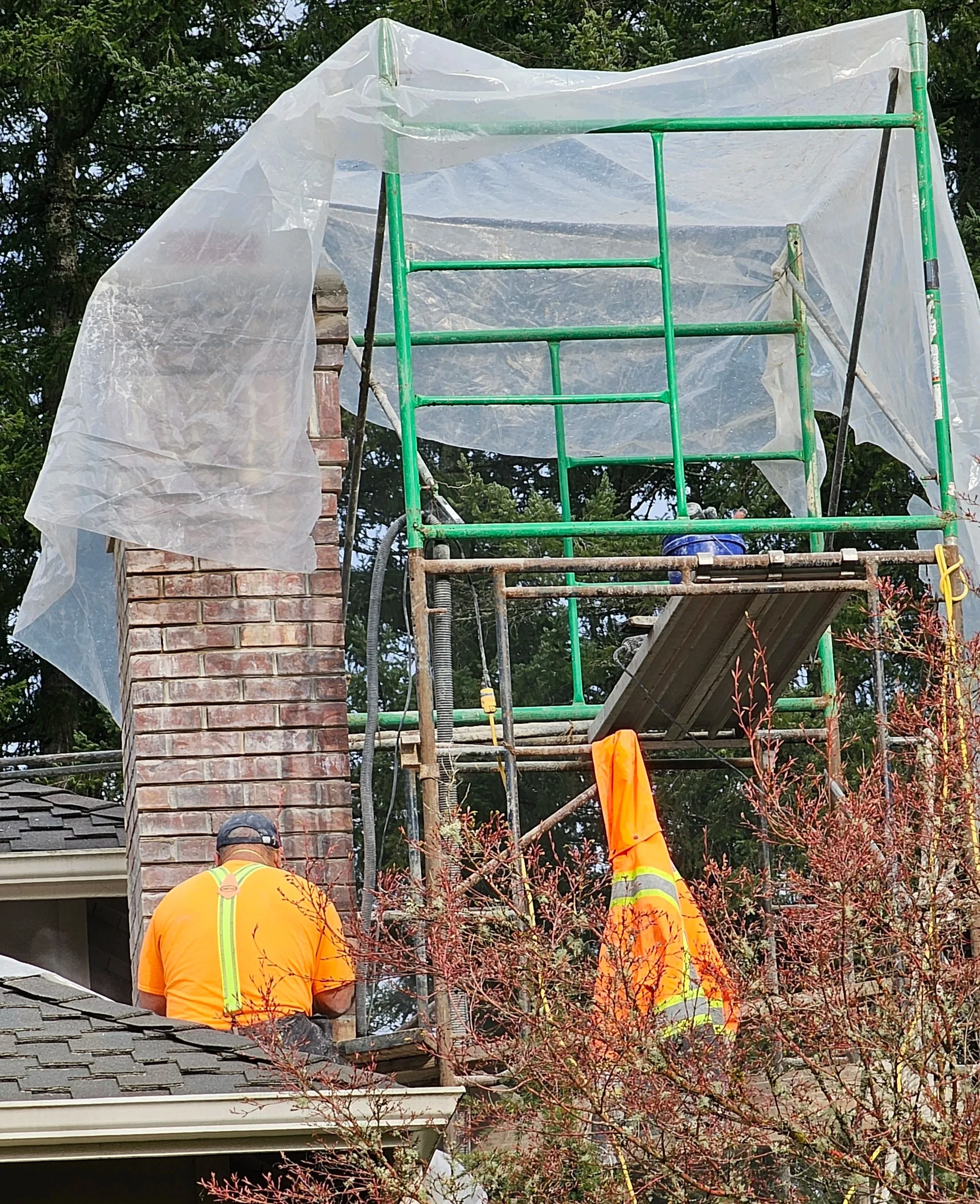 Chimney tuckpointing in rain